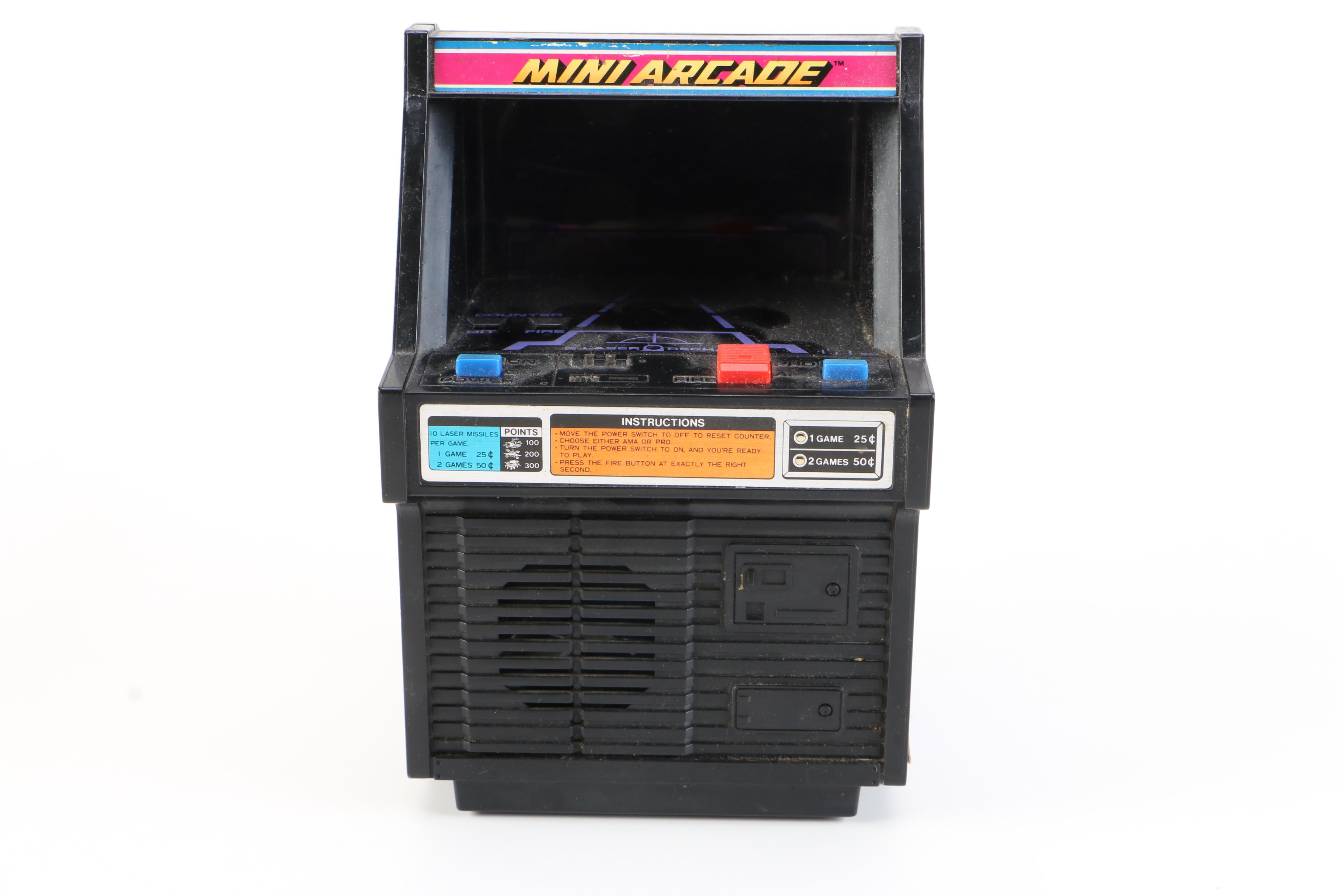 Atari Lynx with Games and a Tomy "Cosmic Clash" Mini Arcade