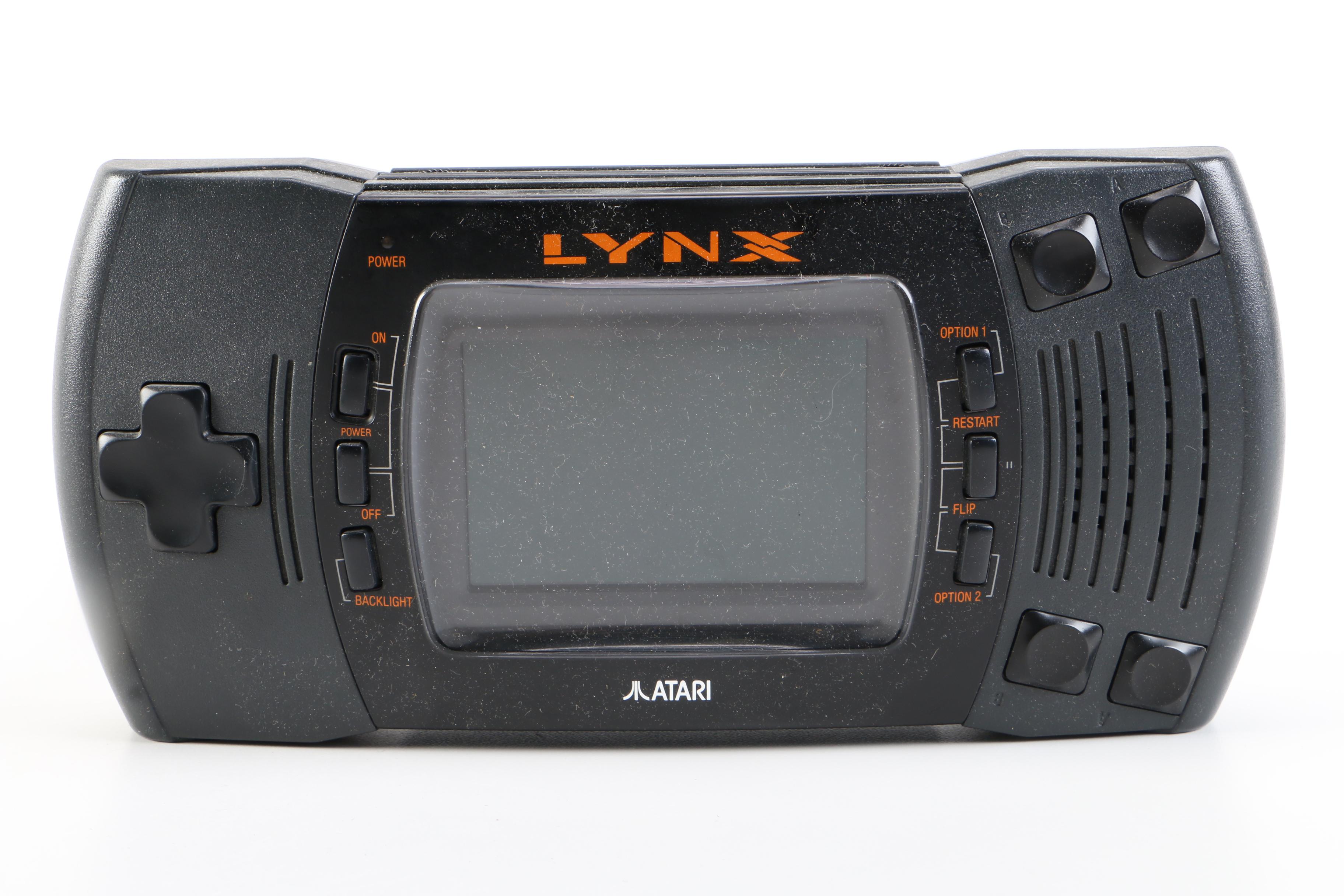 Atari Lynx with Games and a Tomy "Cosmic Clash" Mini Arcade