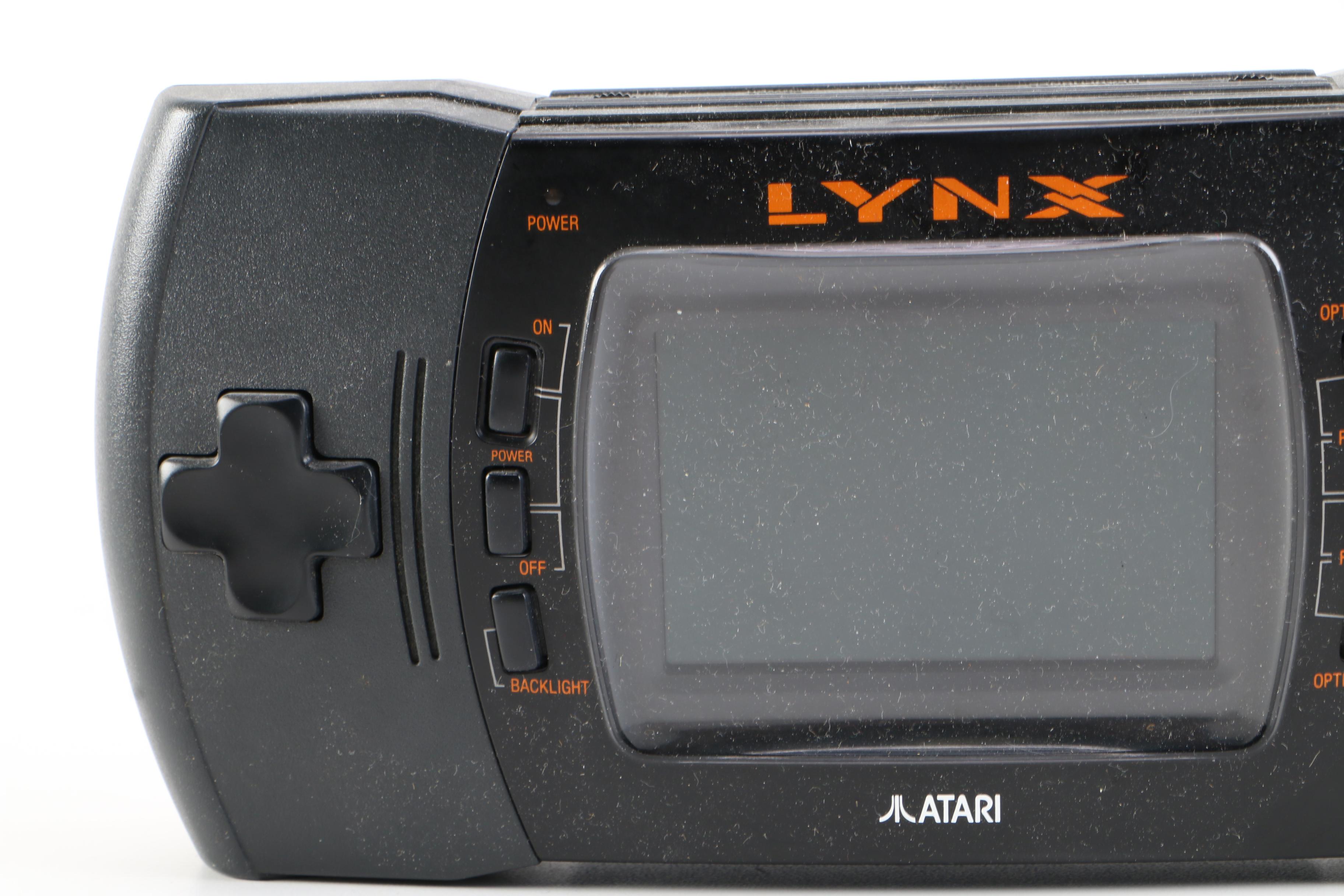 Atari Lynx with Games and a Tomy "Cosmic Clash" Mini Arcade