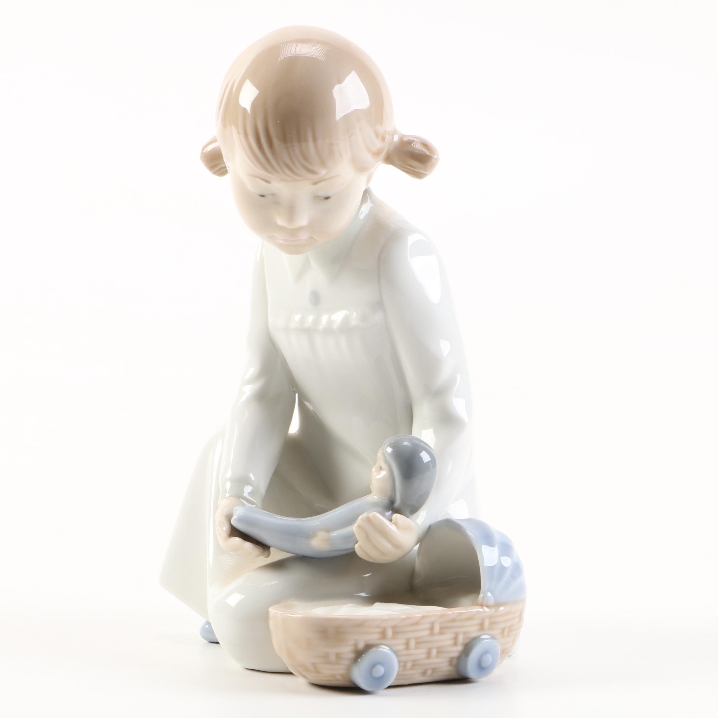 NAO by Lladró Girl With Doll Figurine
