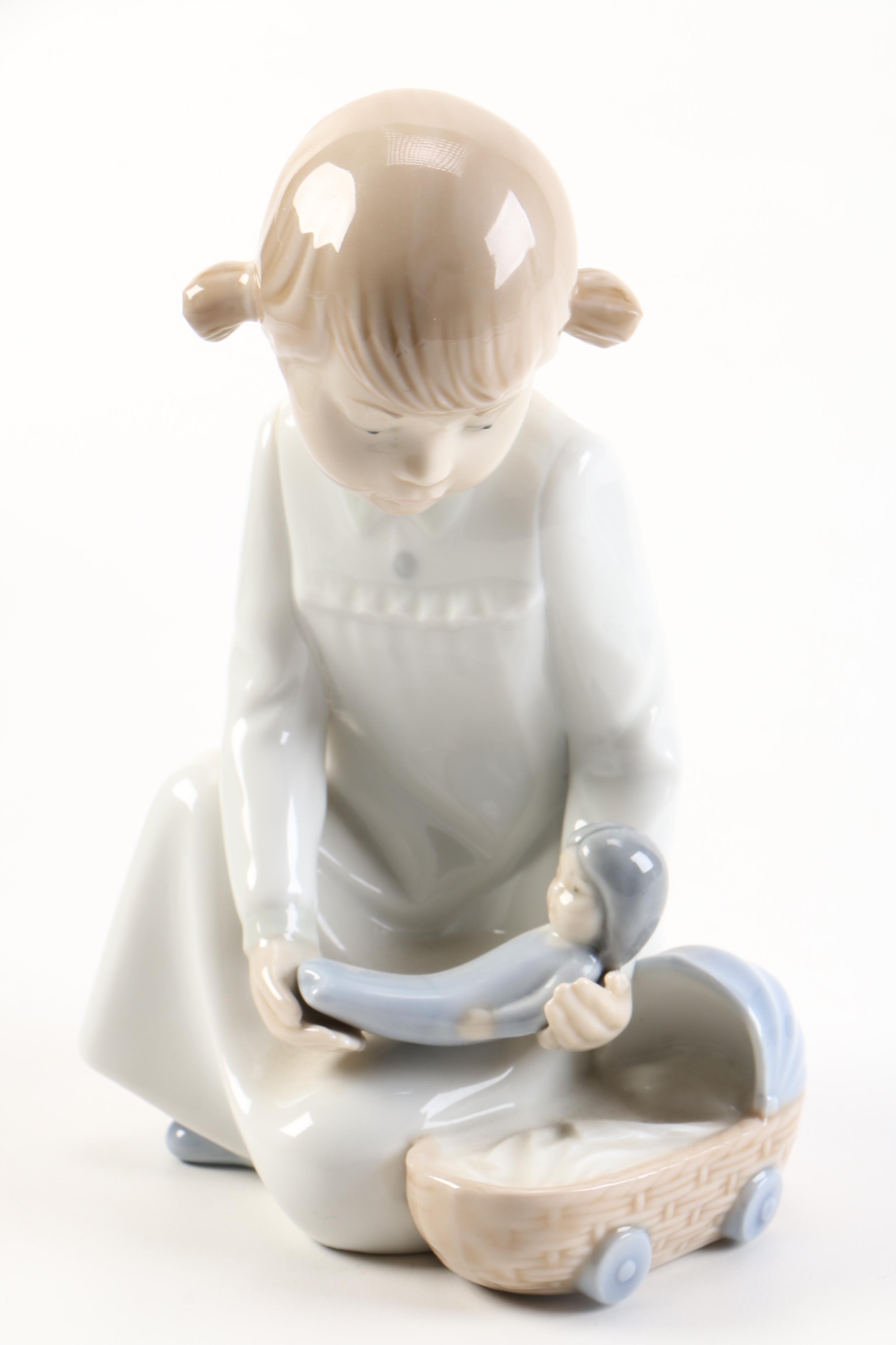 NAO by Lladró Girl With Doll Figurine