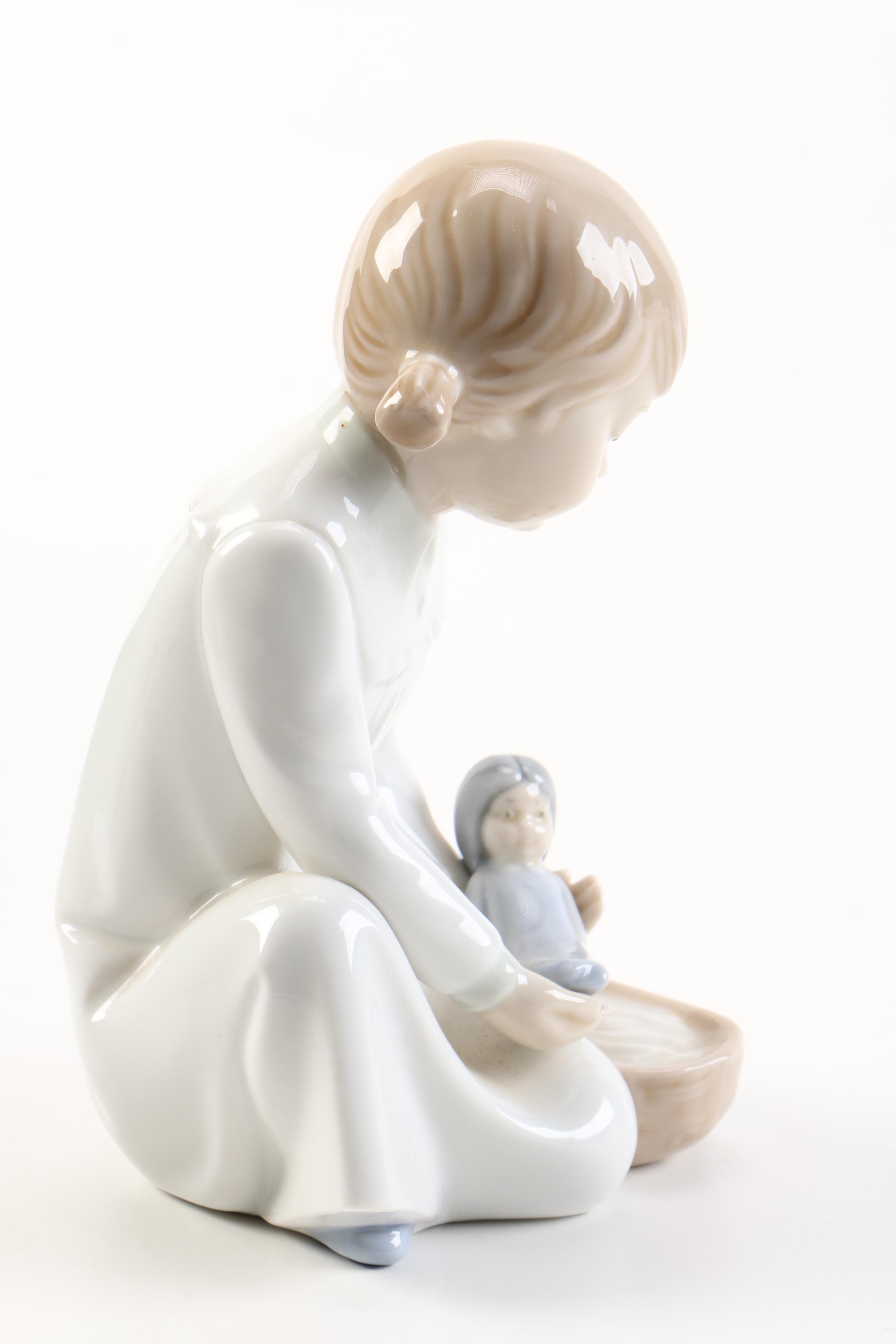 NAO by Lladró Girl With Doll Figurine