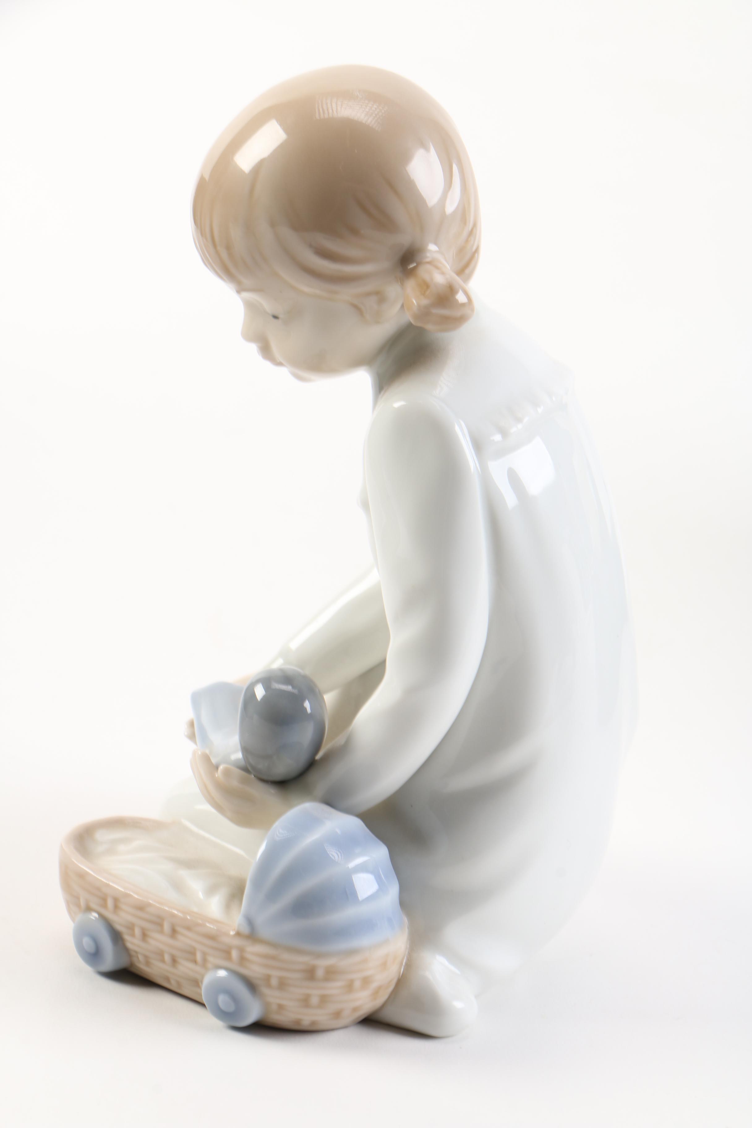 NAO by Lladró Girl With Doll Figurine