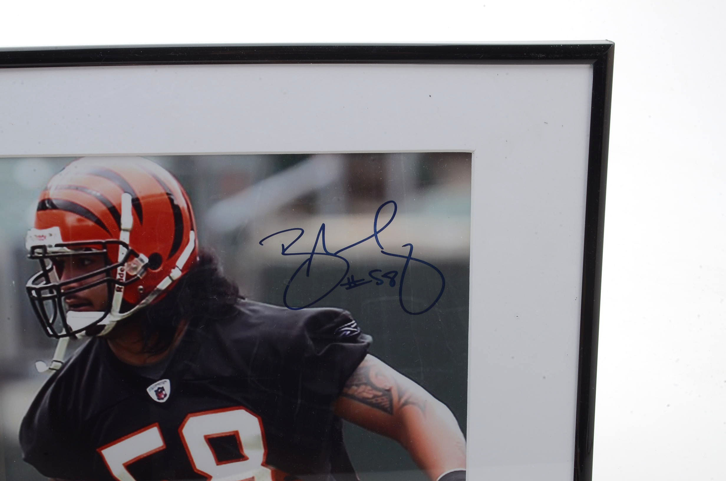 Rey Maualuga Signed Bengals Photo and Chad Johnson Auto Jersey