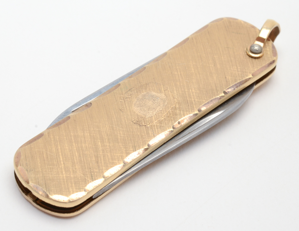 Sterling Silver Eagle Scott Ring and a Gold Tone Pocket Knife