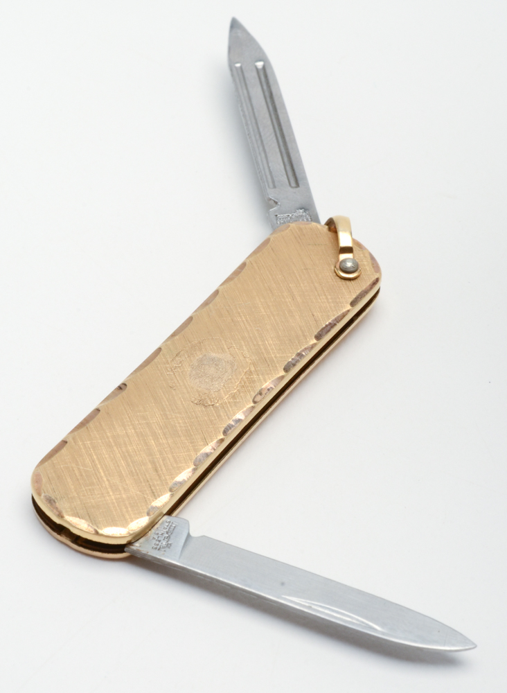 Sterling Silver Eagle Scott Ring and a Gold Tone Pocket Knife