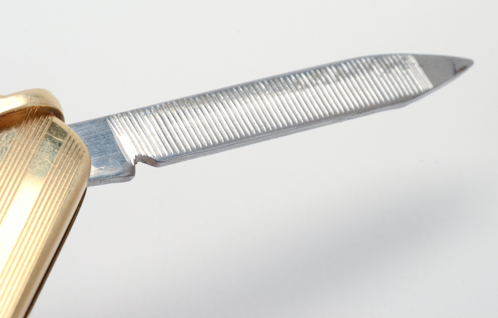 Sterling Silver Eagle Scott Ring and a Gold Tone Pocket Knife