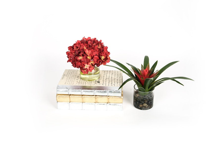 Selection of Decorative Books and Floral Decor