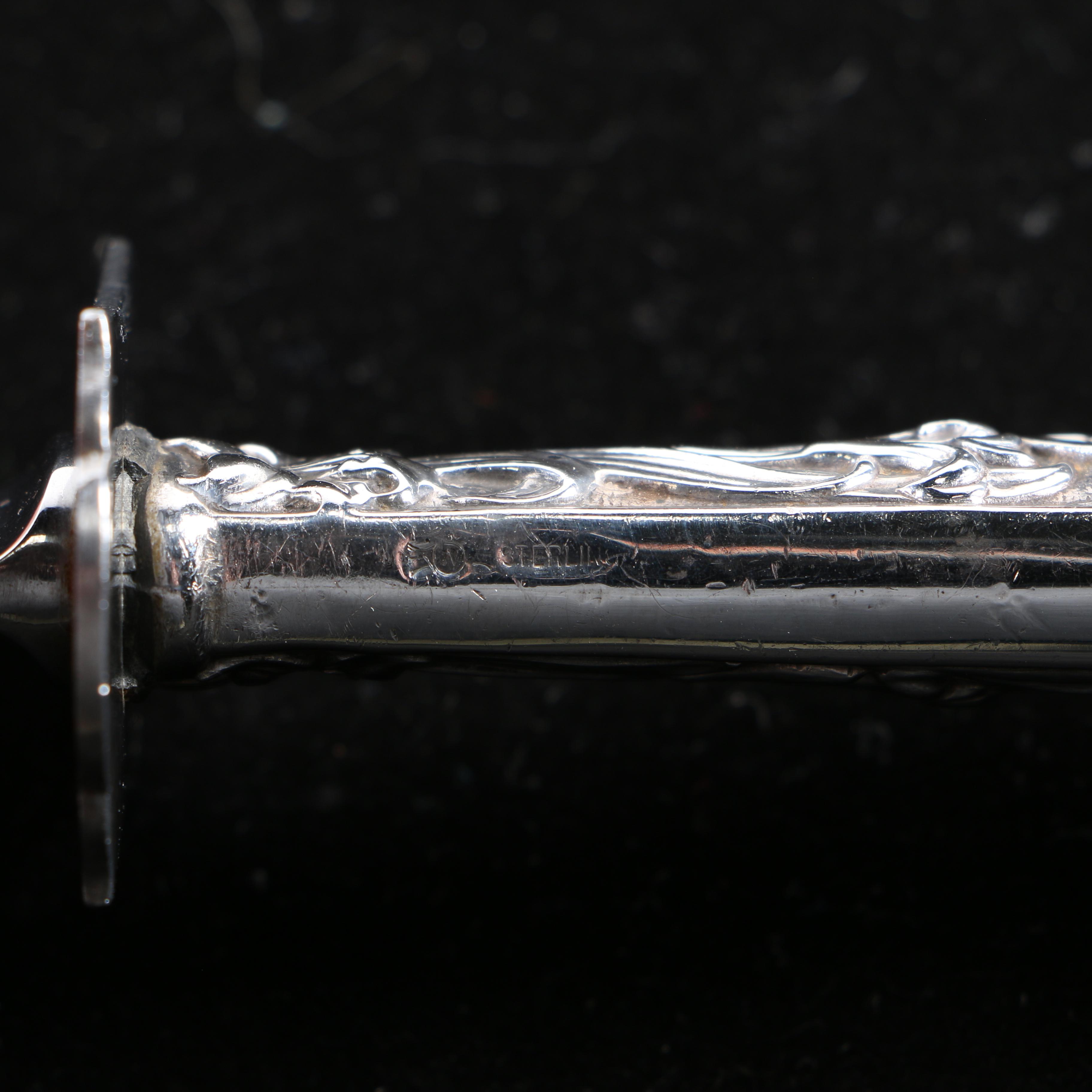 Frank M Whiting & Co Sterling Handled Carving Knife and a Sterling Handled Carving Fork