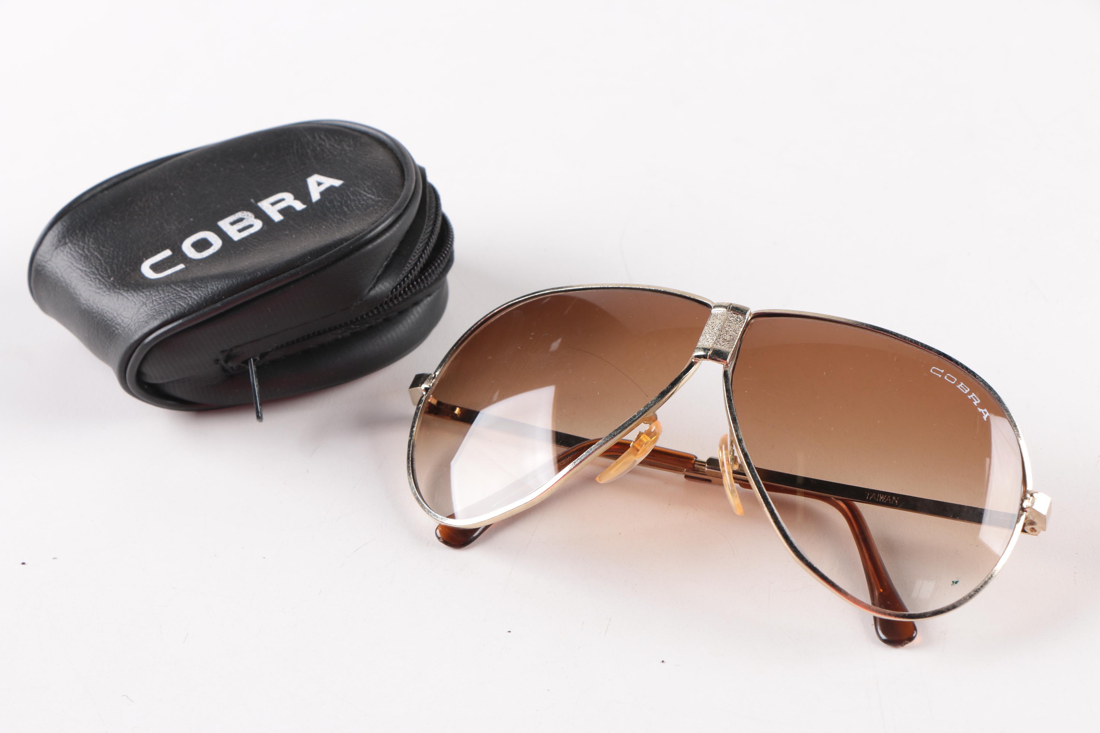 Collection of Foldable Sunglasses and Cases by Cobra and Ferrari