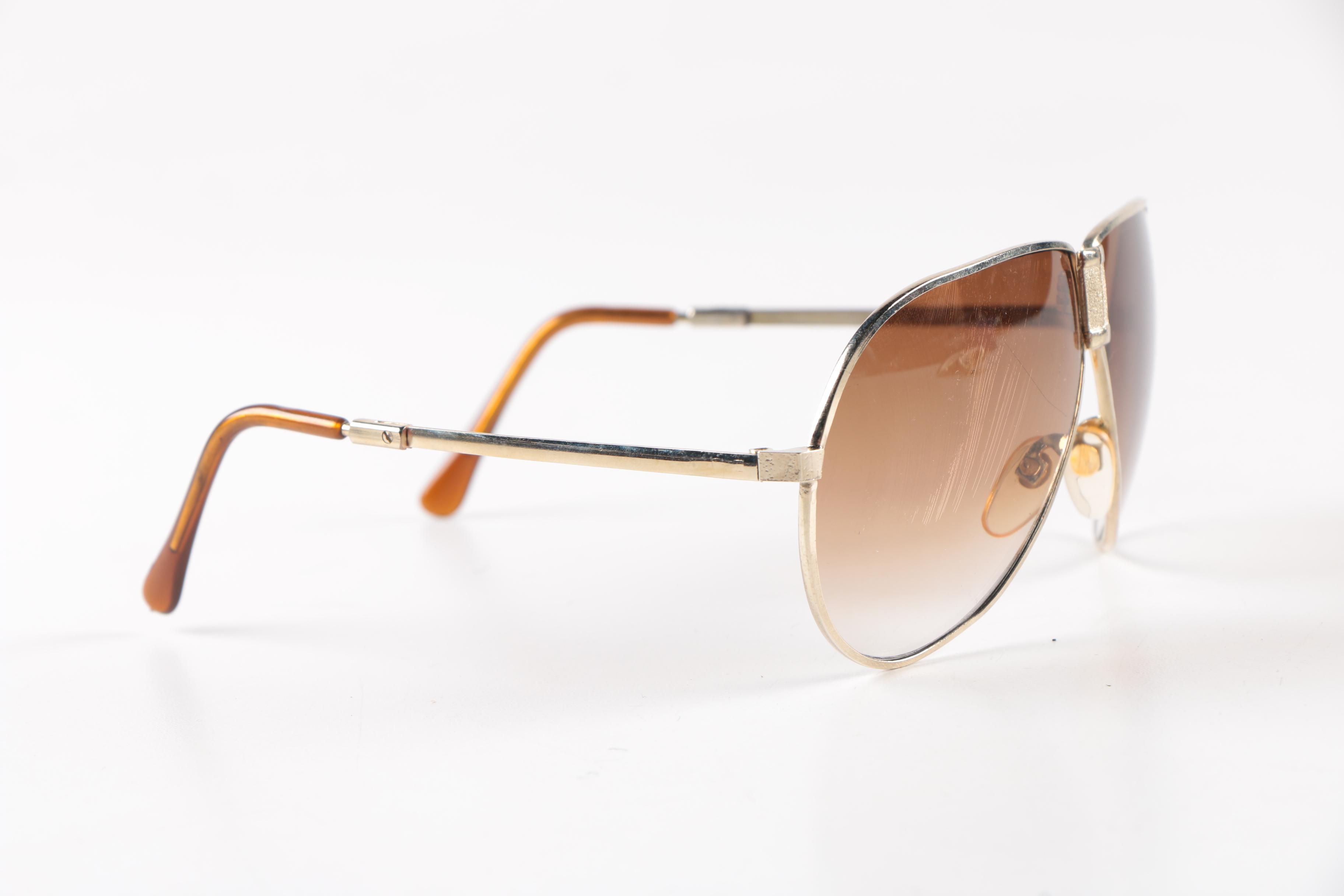 Collection of Foldable Sunglasses and Cases by Cobra and Ferrari