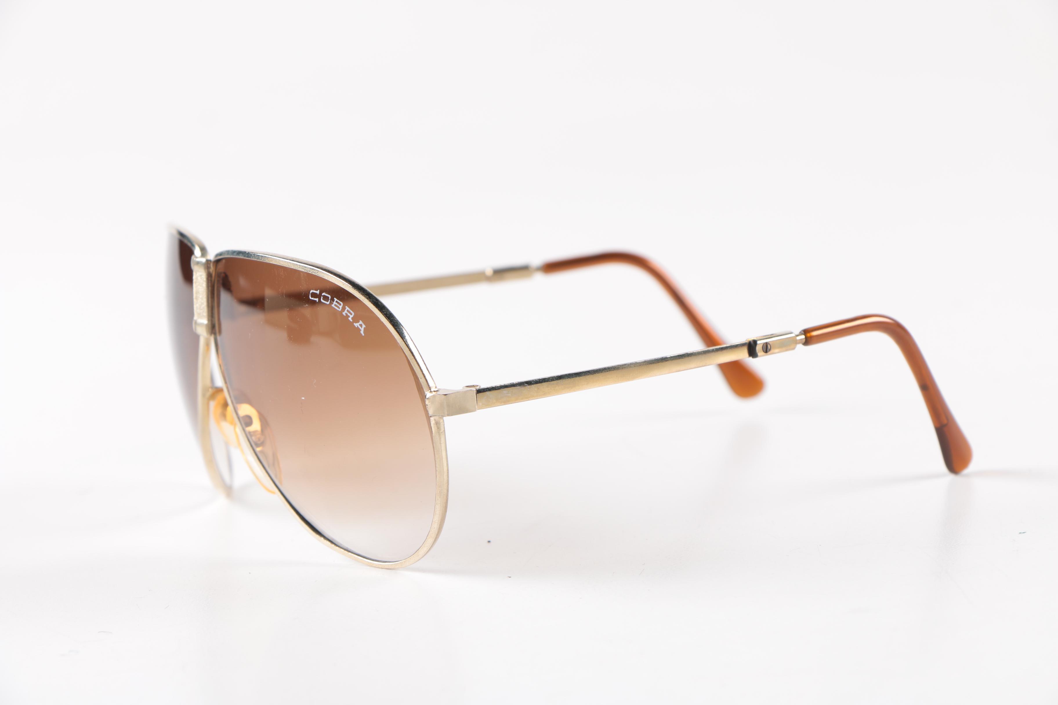 Collection of Foldable Sunglasses and Cases by Cobra and Ferrari