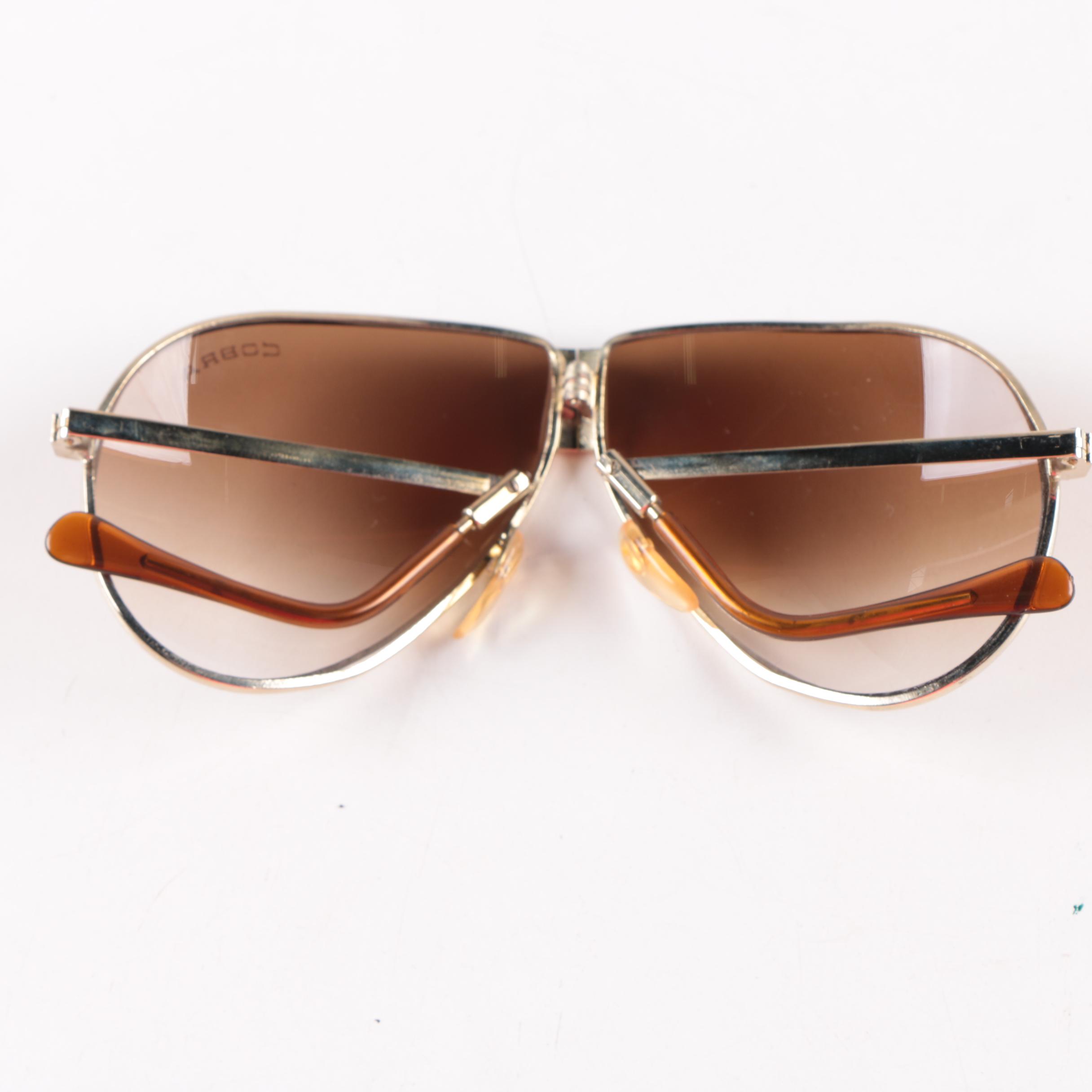 Collection of Foldable Sunglasses and Cases by Cobra and Ferrari