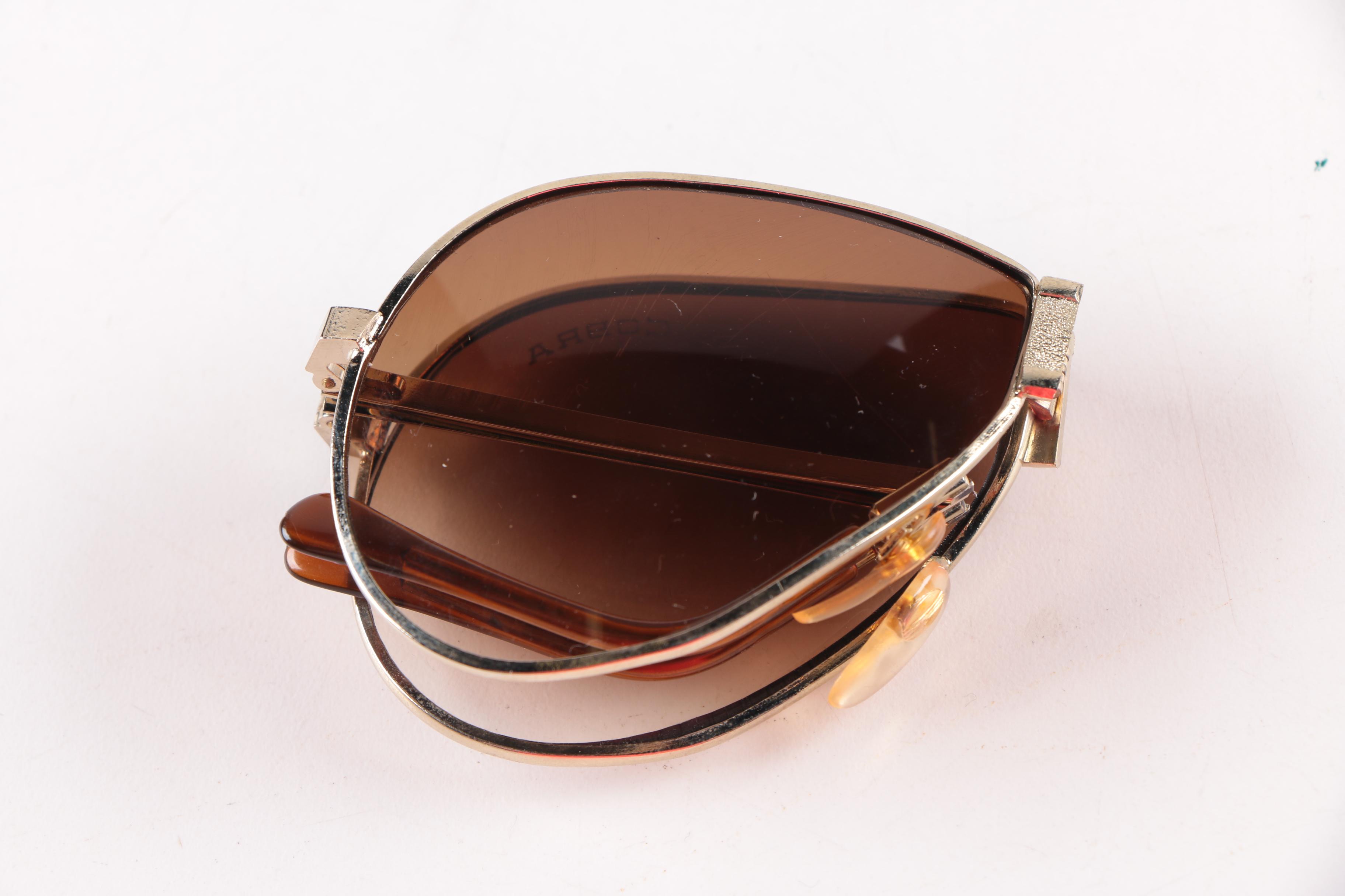 Collection of Foldable Sunglasses and Cases by Cobra and Ferrari