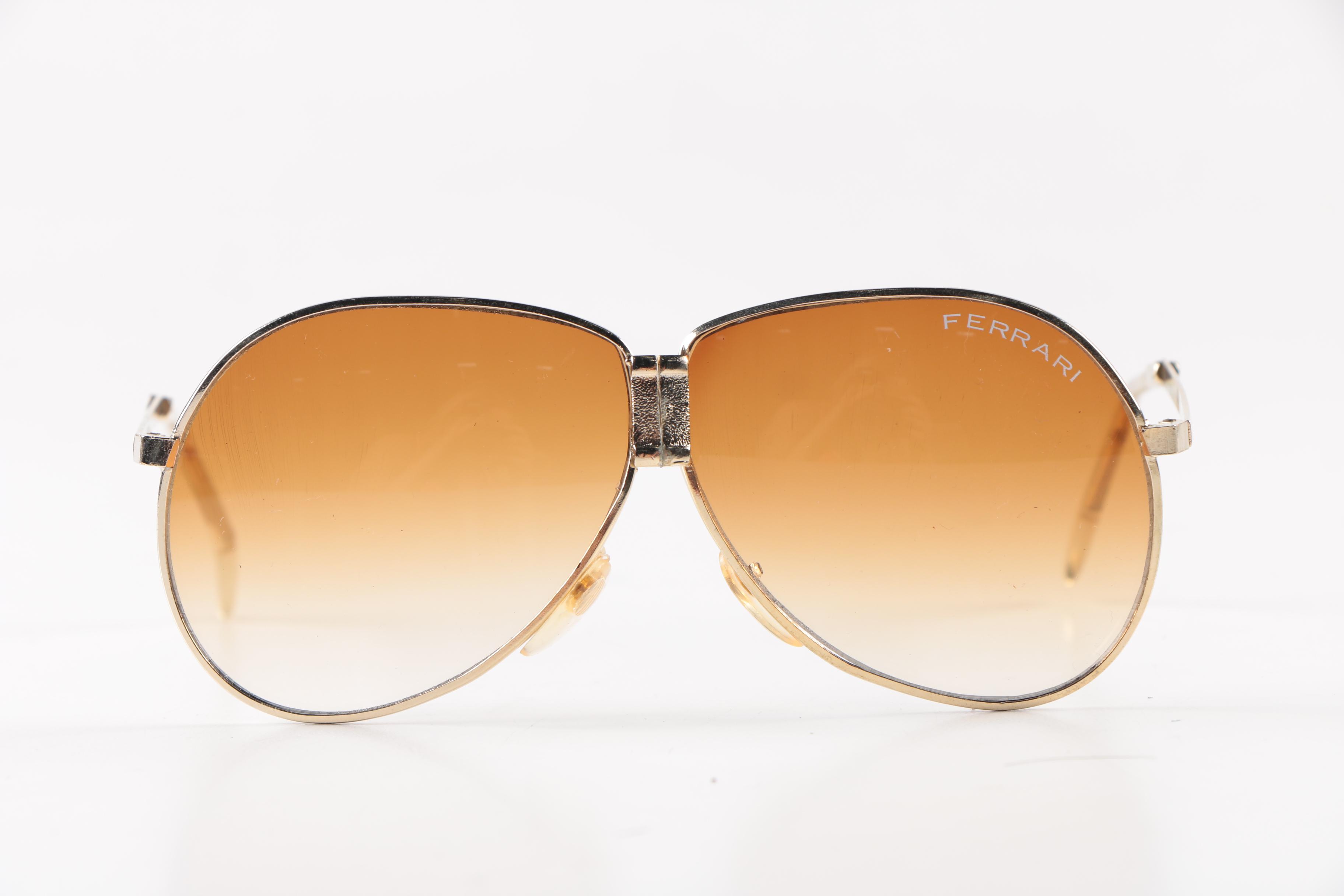 Collection of Foldable Sunglasses and Cases by Cobra and Ferrari