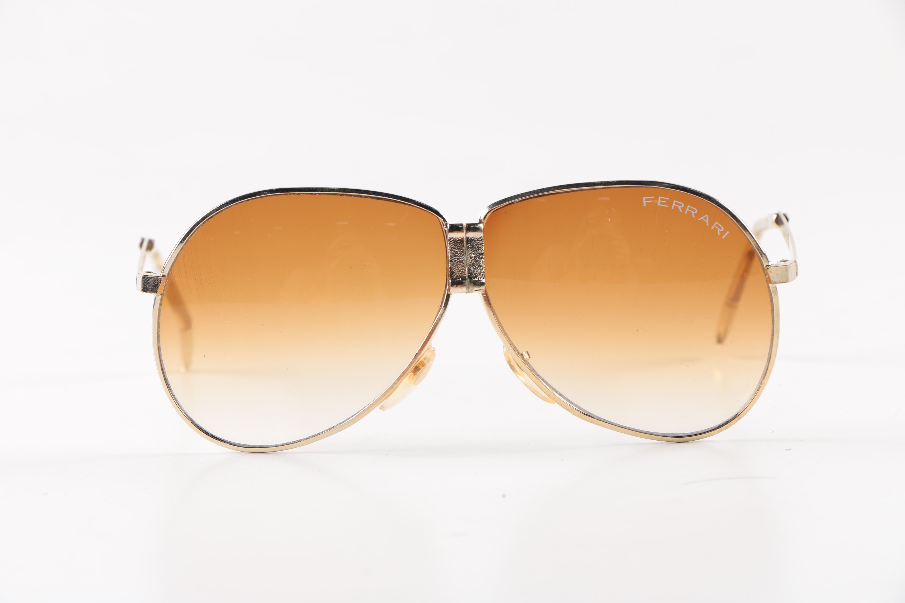 Collection of Foldable Sunglasses and Cases by Cobra and Ferrari