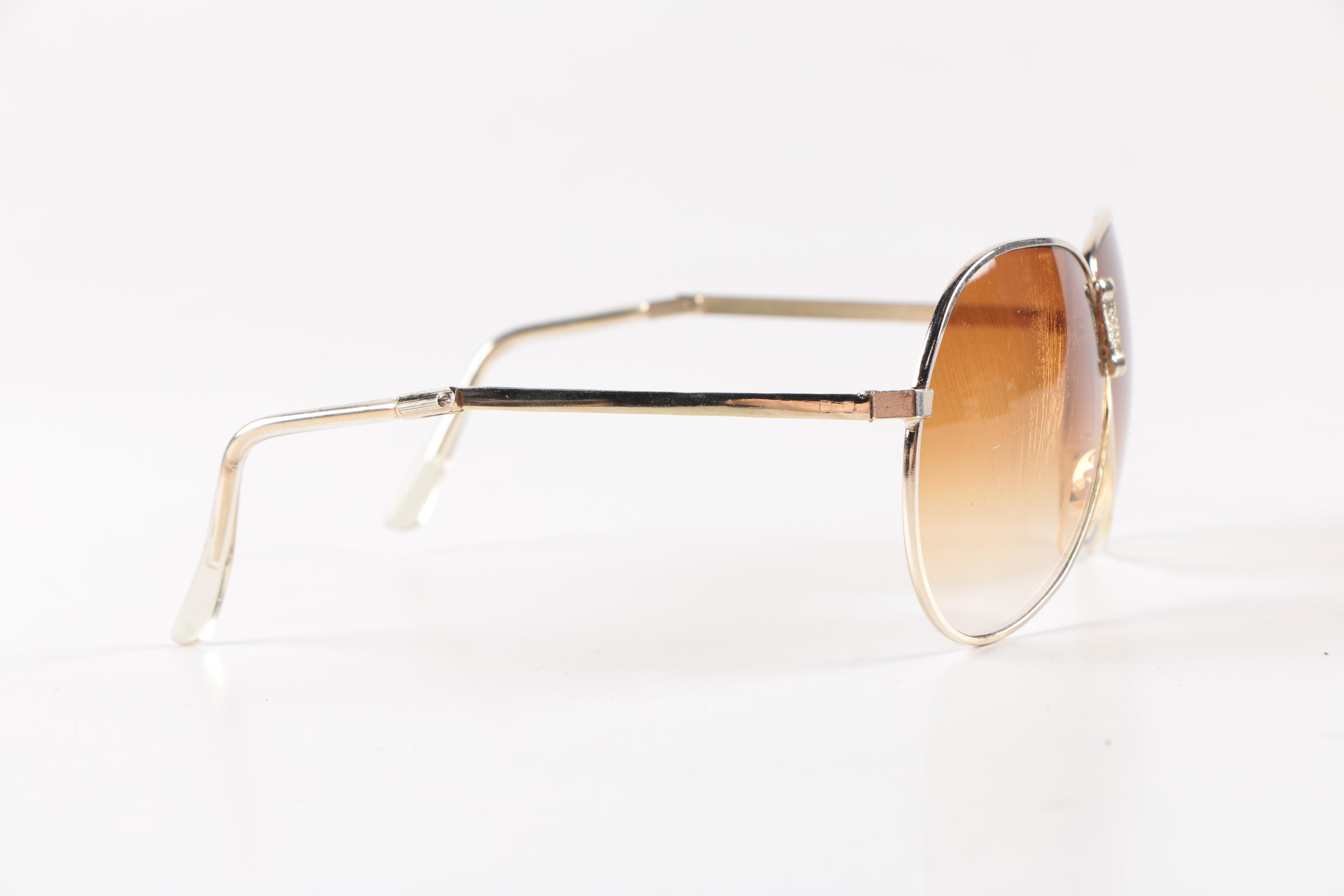 Collection of Foldable Sunglasses and Cases by Cobra and Ferrari
