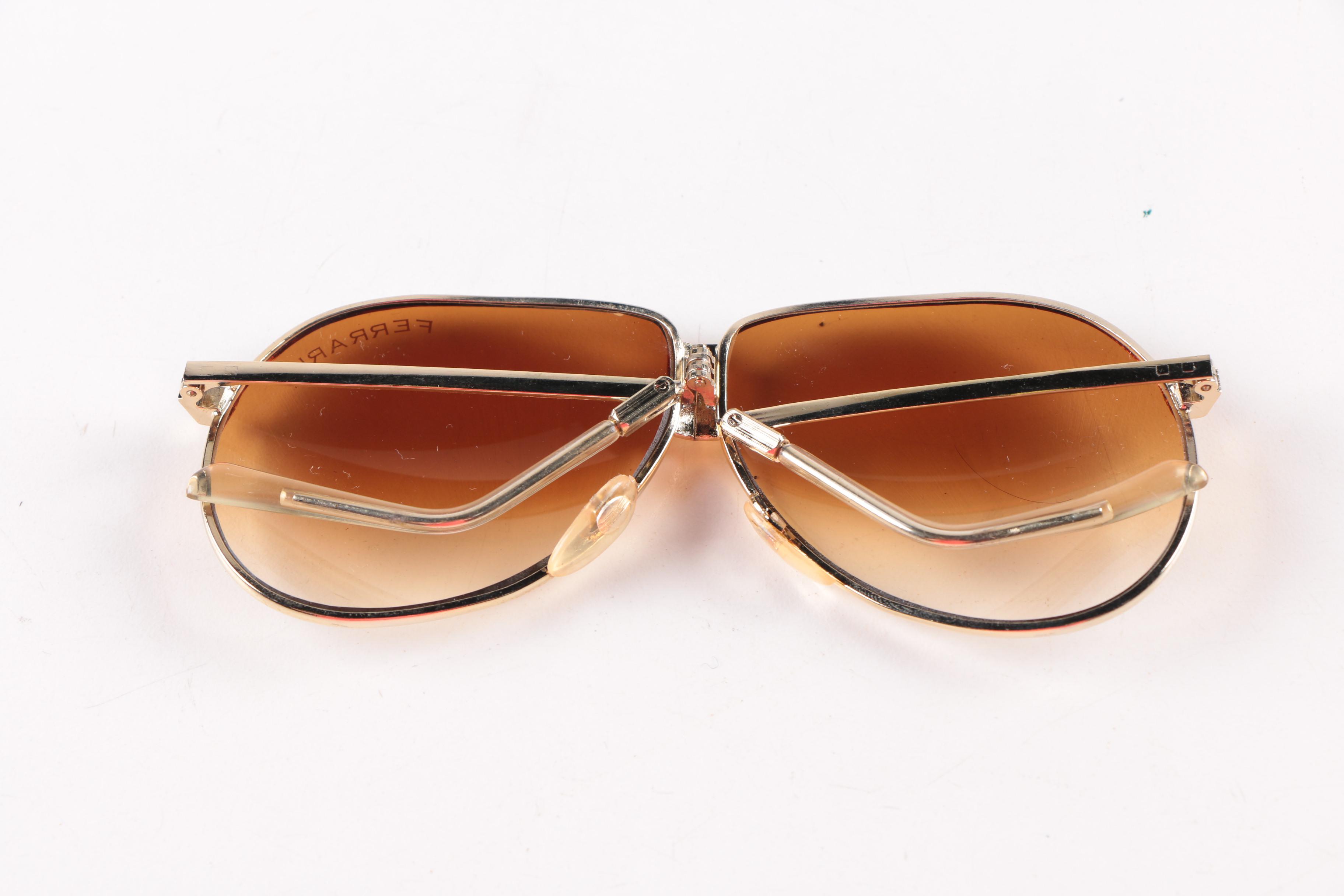 Collection of Foldable Sunglasses and Cases by Cobra and Ferrari