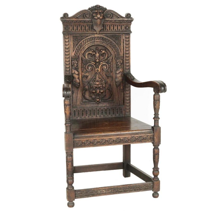 Antique Renaissance Revival Carved Oak Armchair