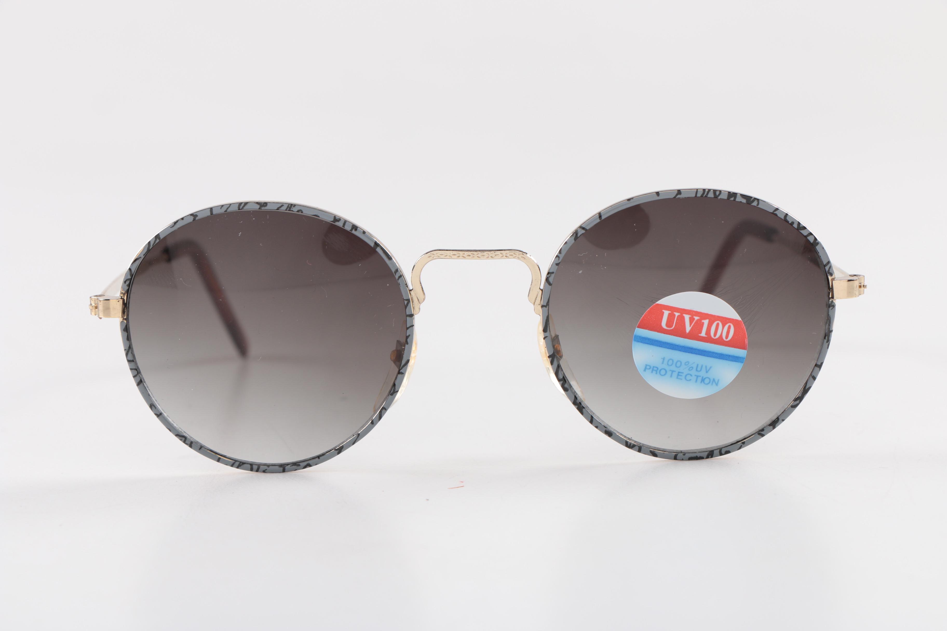 Assortment of Men's Sunglasses including Cobra