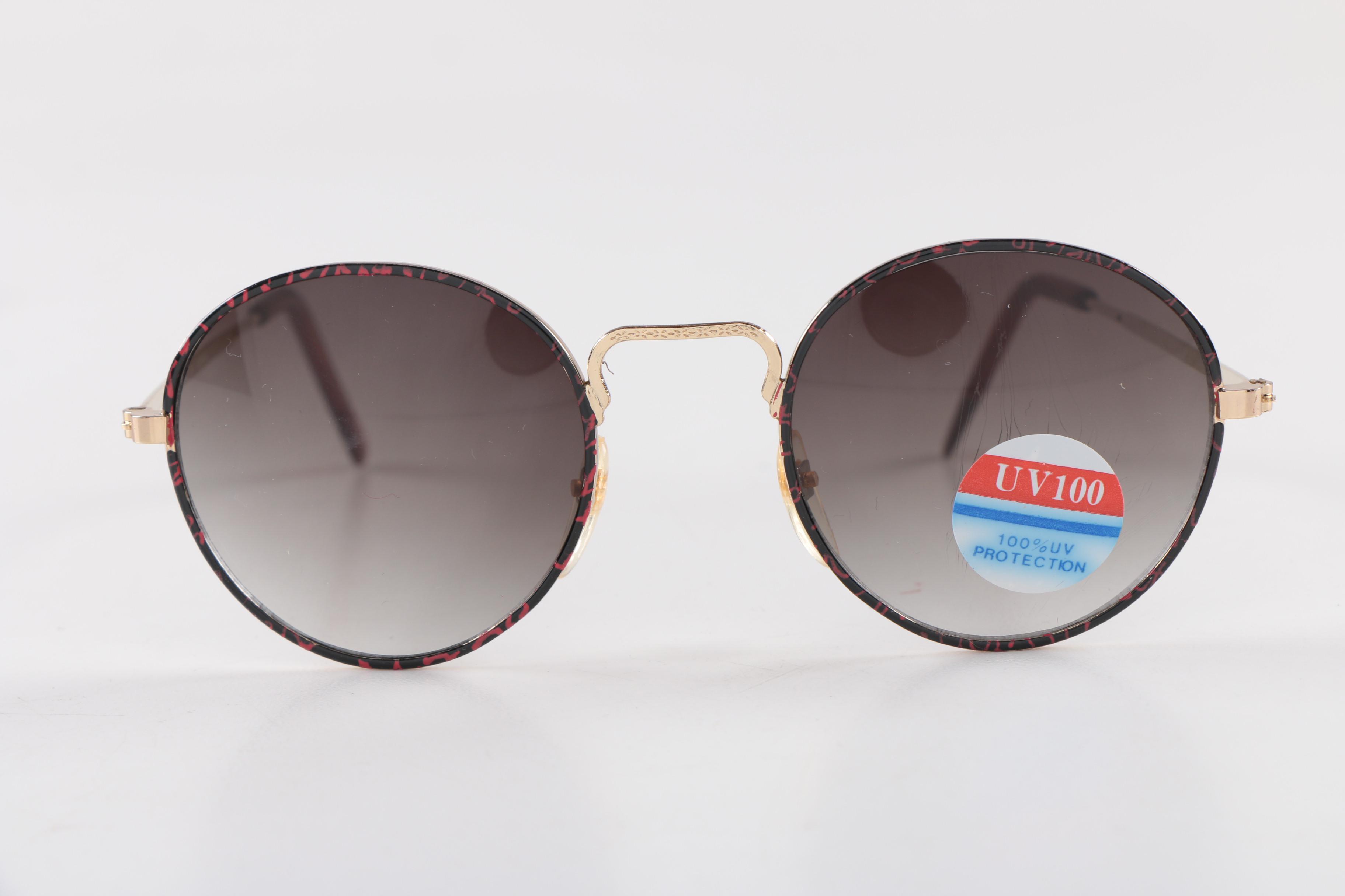 Assortment of Men's Sunglasses including Cobra