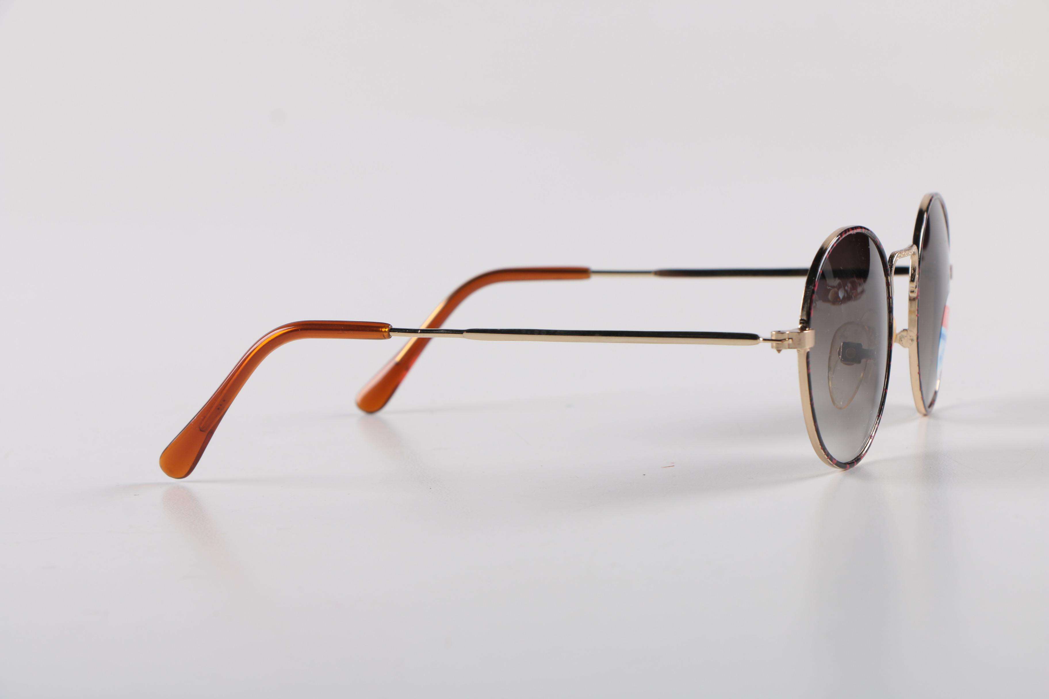 Assortment of Men's Sunglasses including Cobra