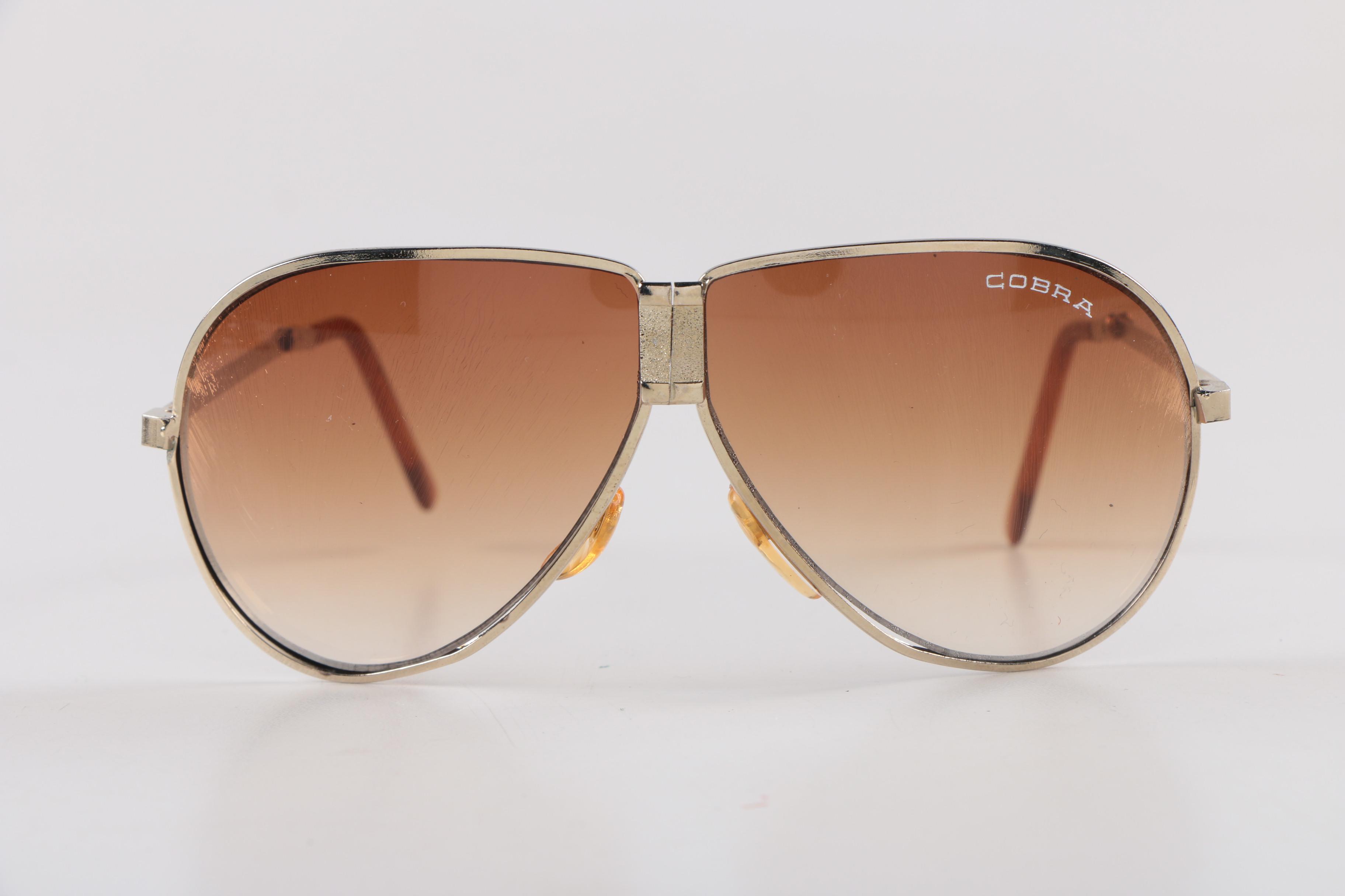 Assortment of Men's Sunglasses including Cobra