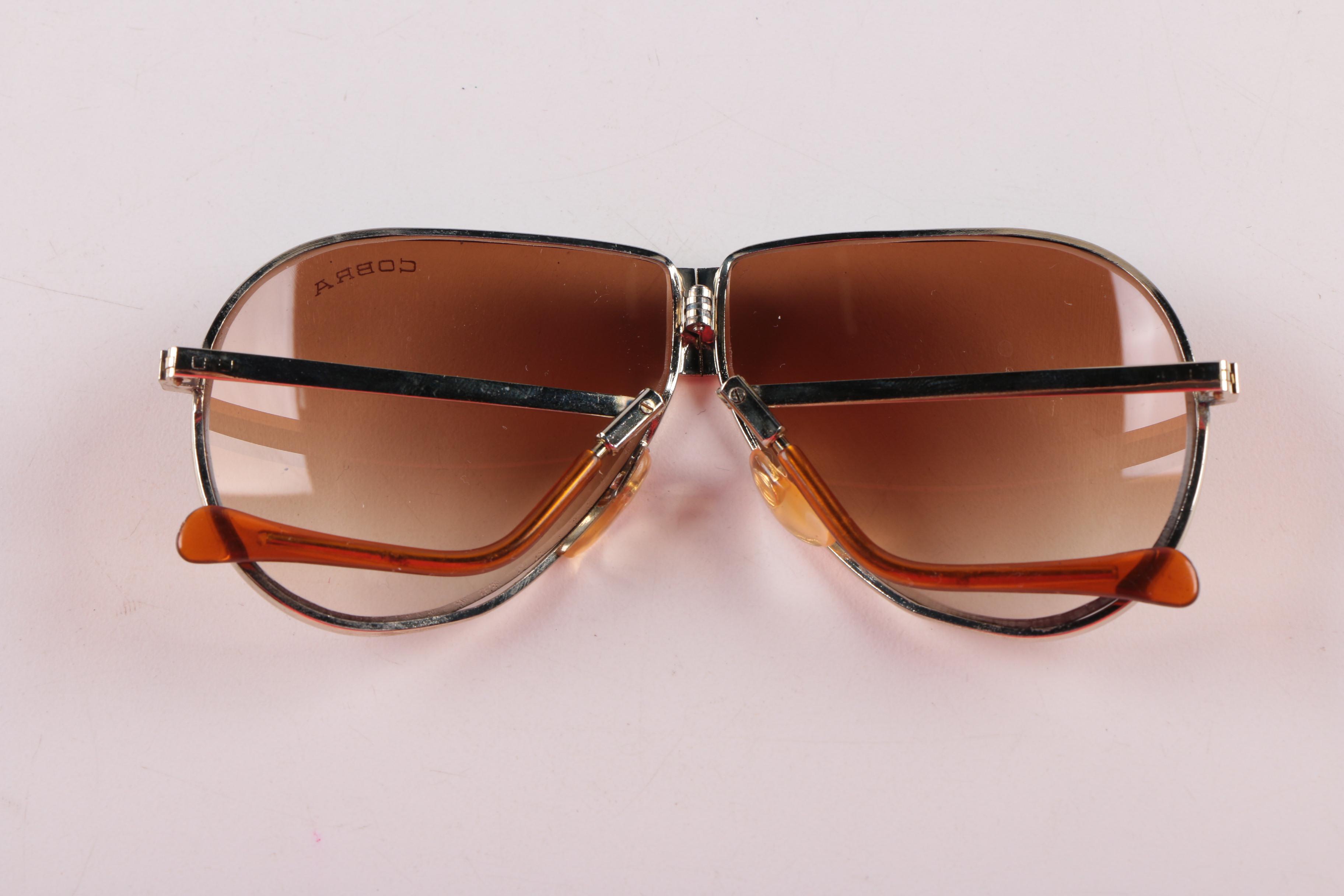 Assortment of Men's Sunglasses including Cobra