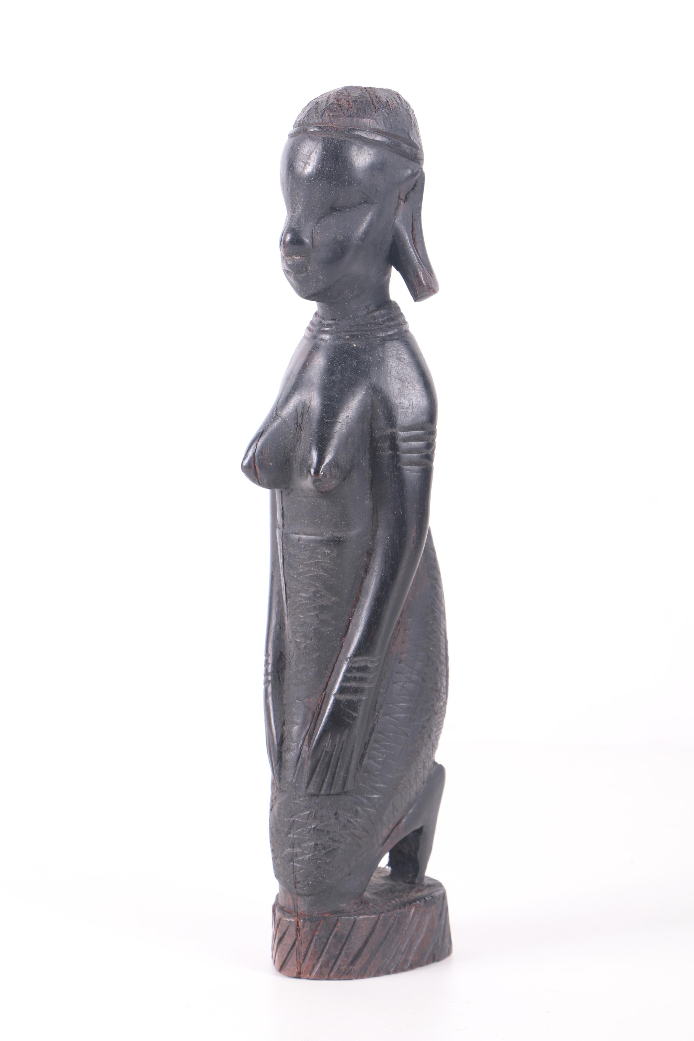 Kenyan Carved Wood Figurines Including Work by Dawson