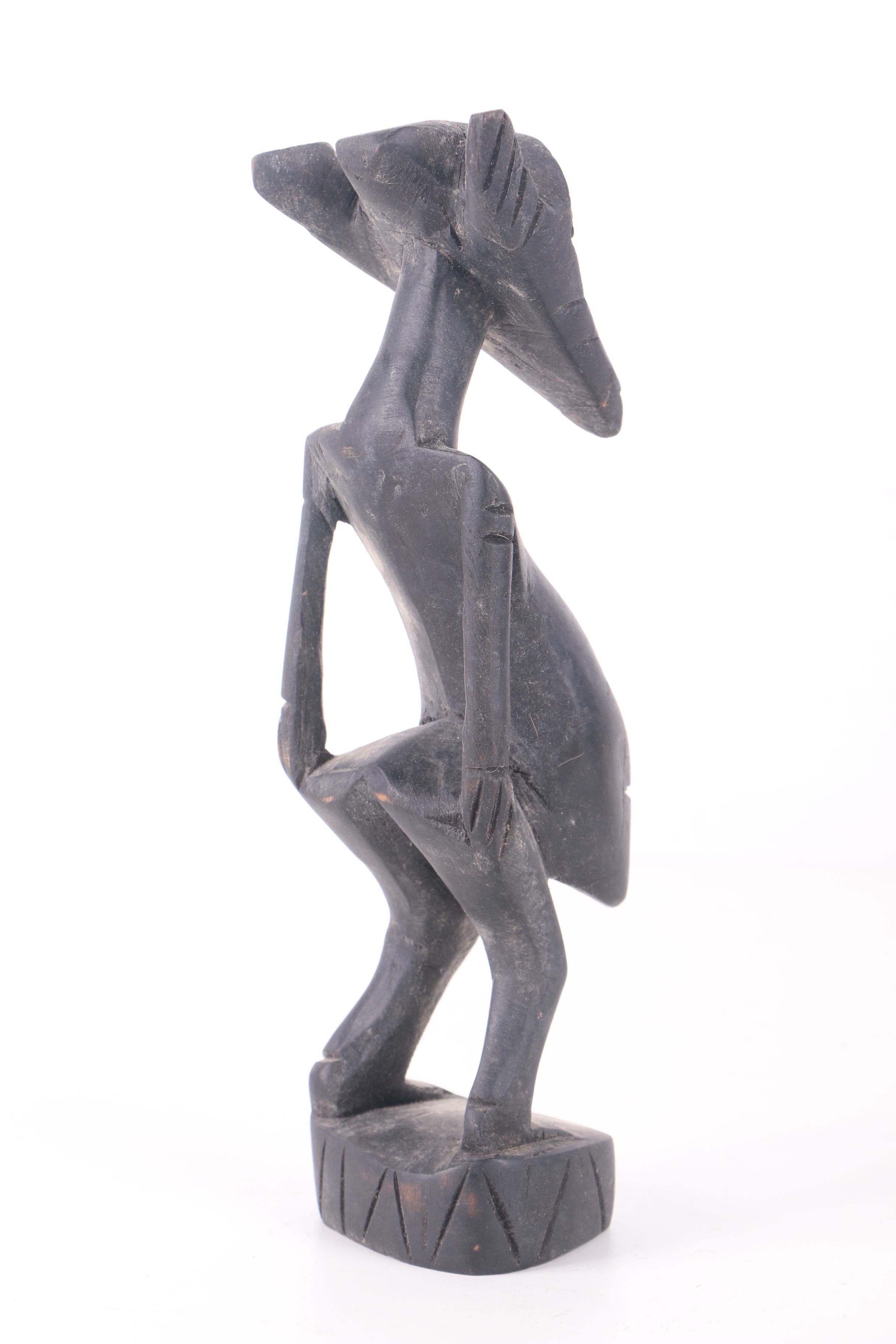 Kenyan Carved Wood Figurines Including Work by Dawson