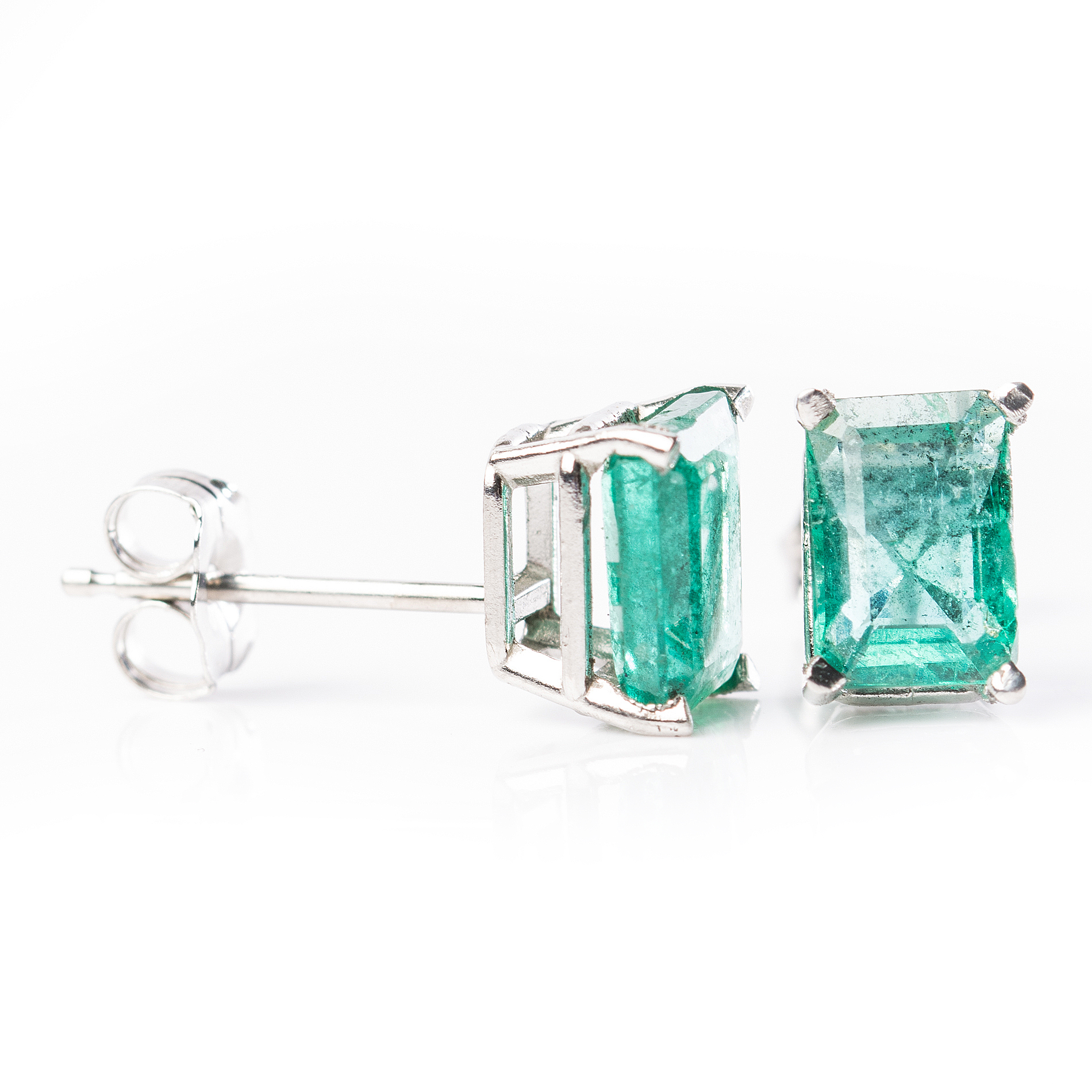 Platinum and 1.50 CTW Emerald Earrings