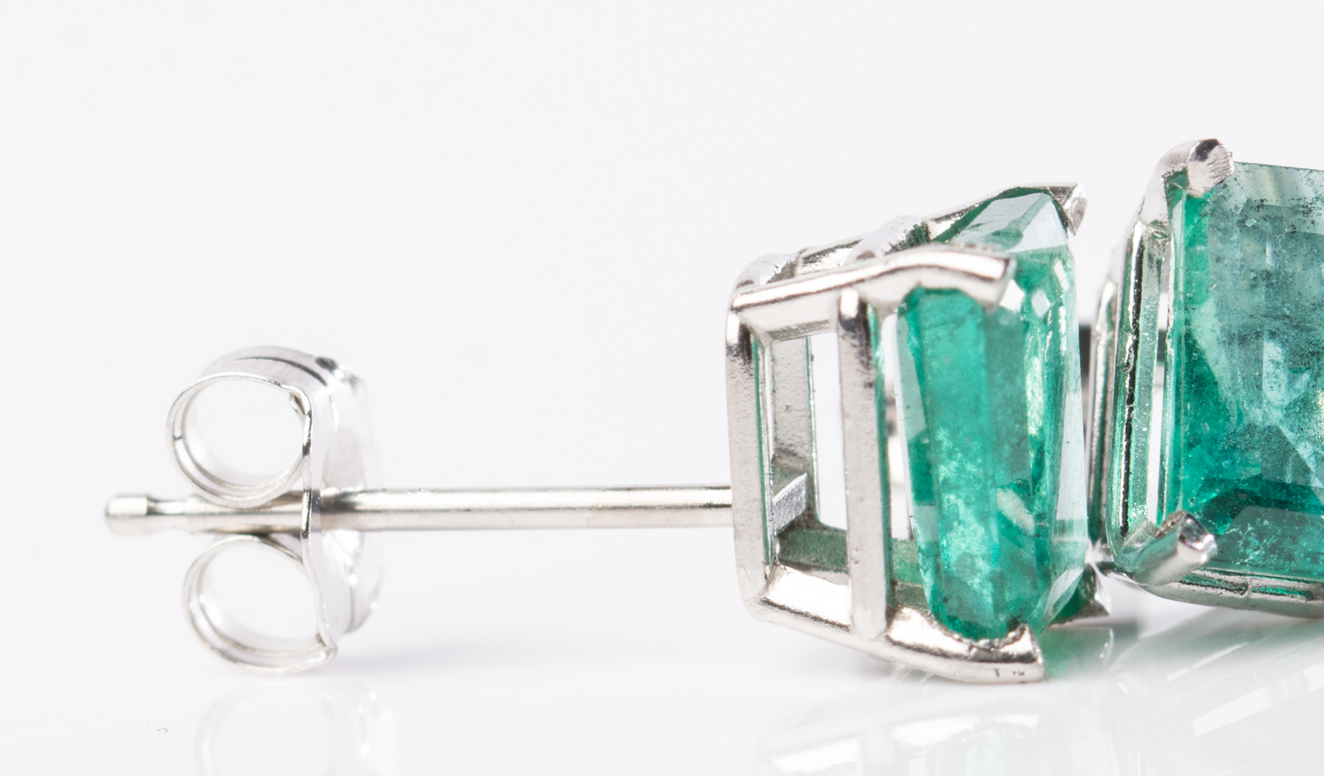 Platinum and 1.50 CTW Emerald Earrings