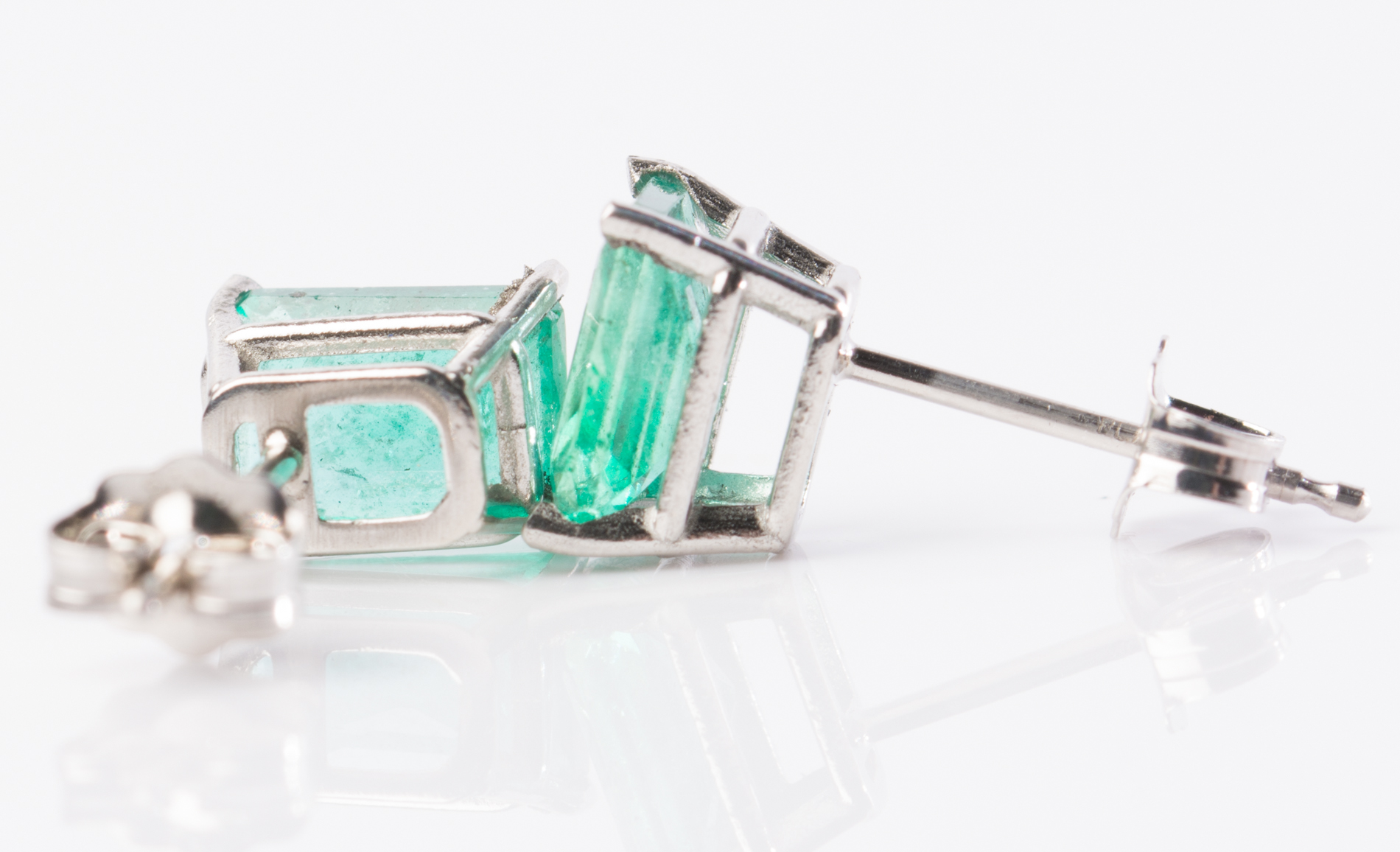 Platinum and 1.50 CTW Emerald Earrings