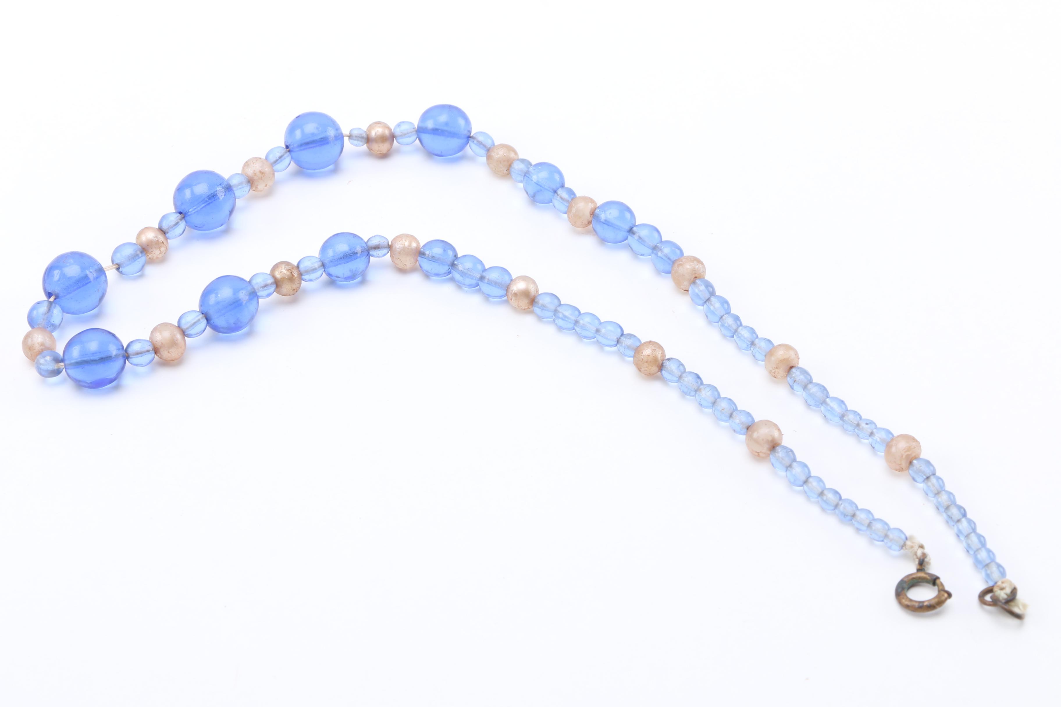 Costume Jewelry Including a Trifari Necklace With Sterling Silver Chain