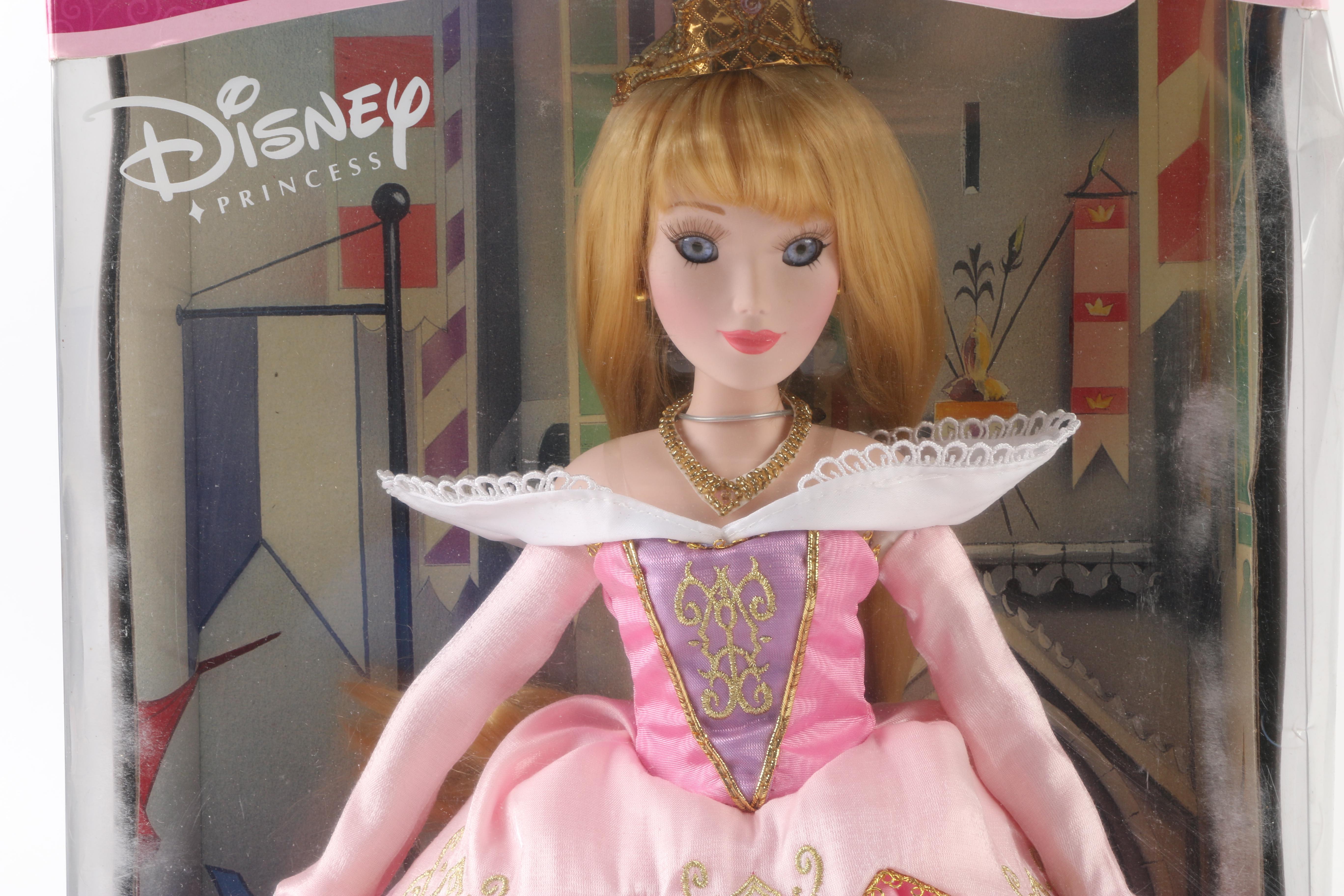 Three Disney Princess Dolls in Boxes