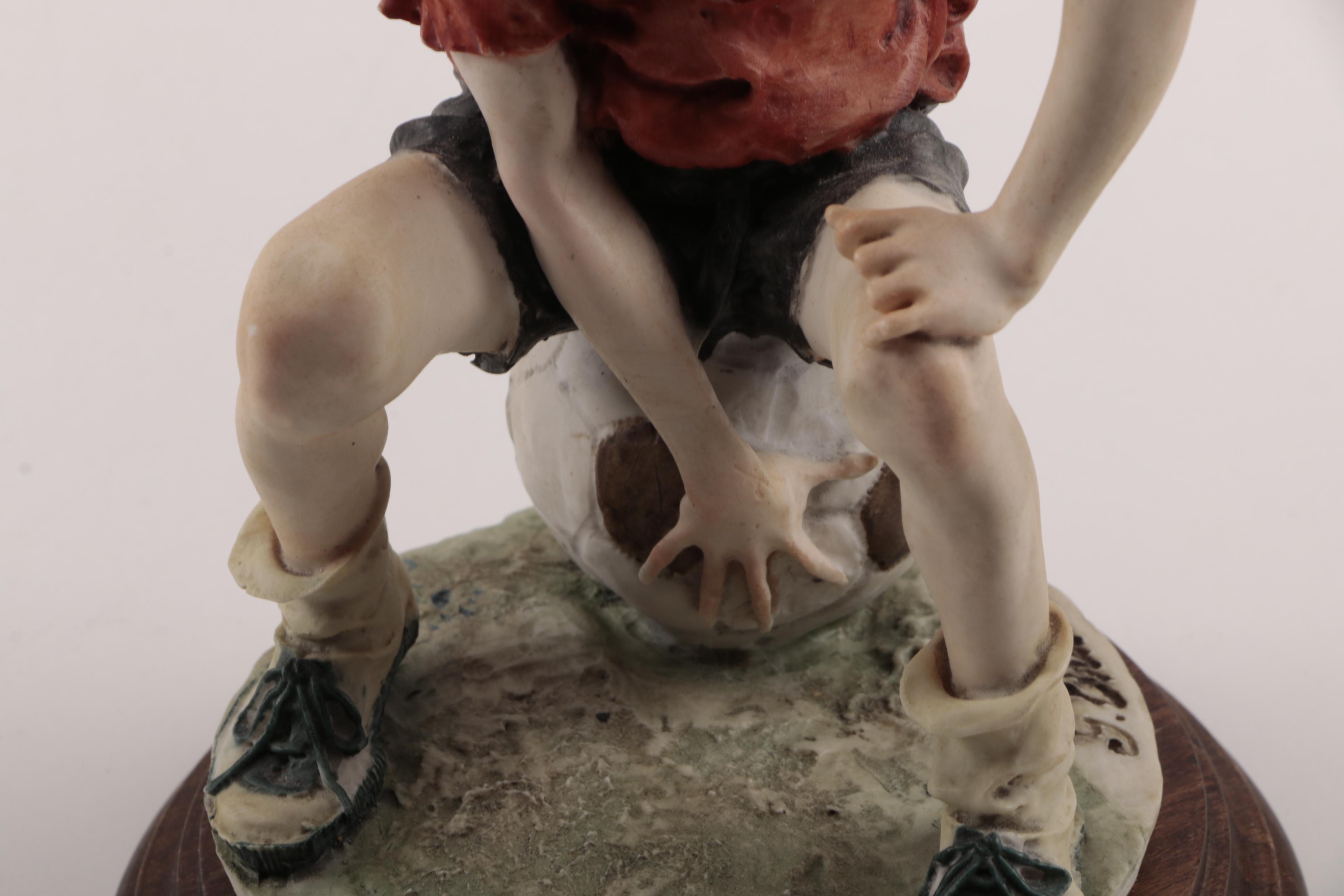 Sports Themed Ceramic Figurines Including Laszo Ispanky