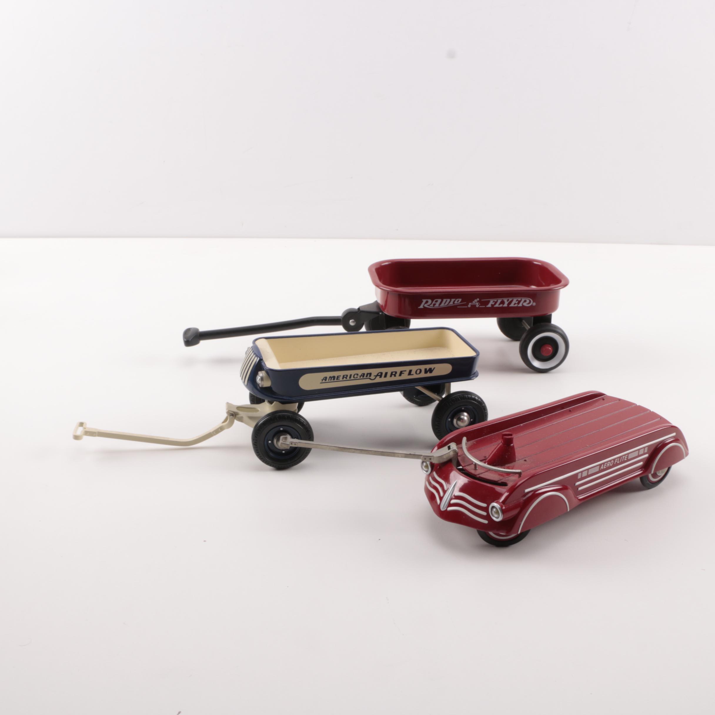 Three Toy Sized Wagons