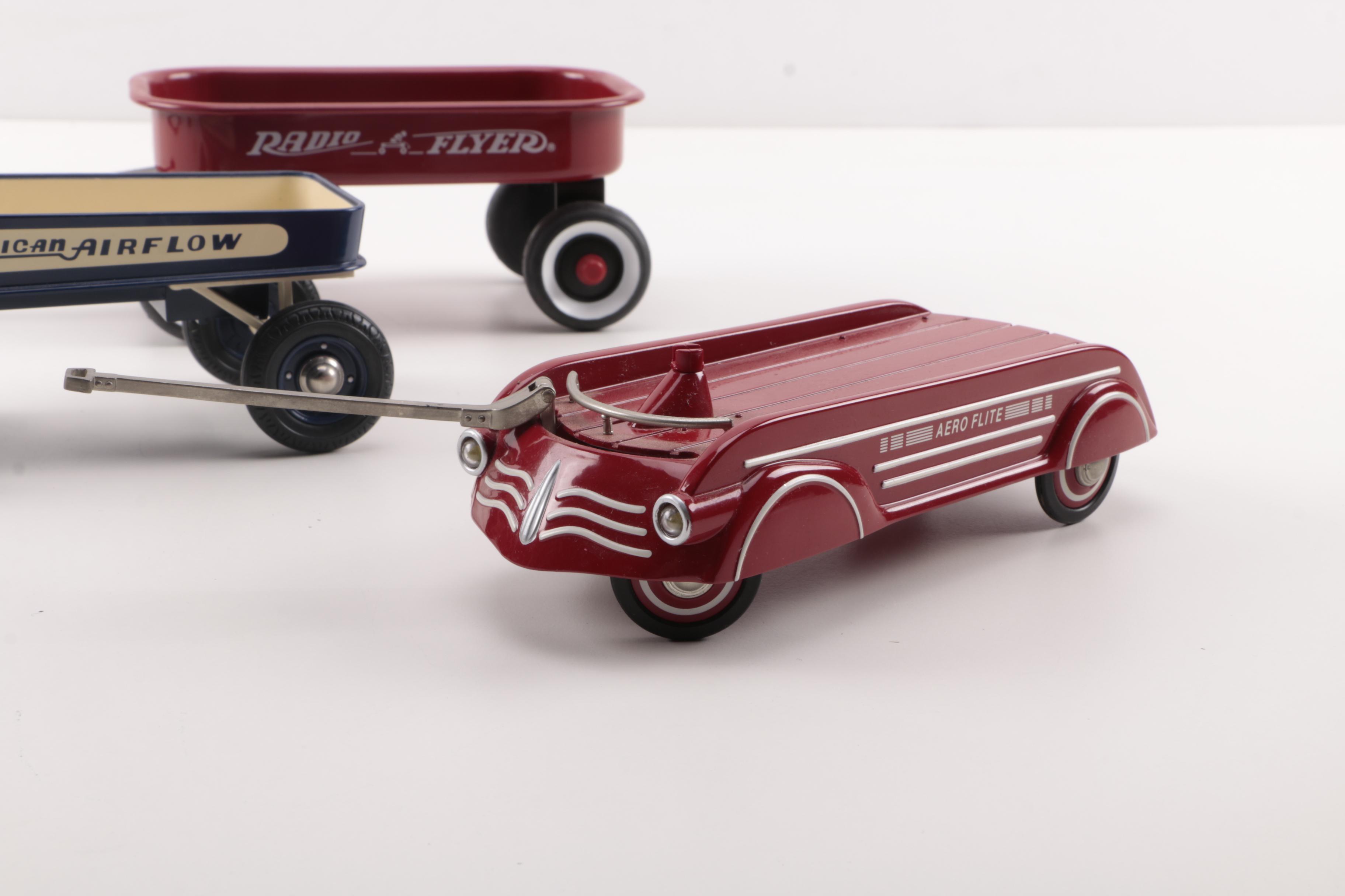 Three Toy Sized Wagons