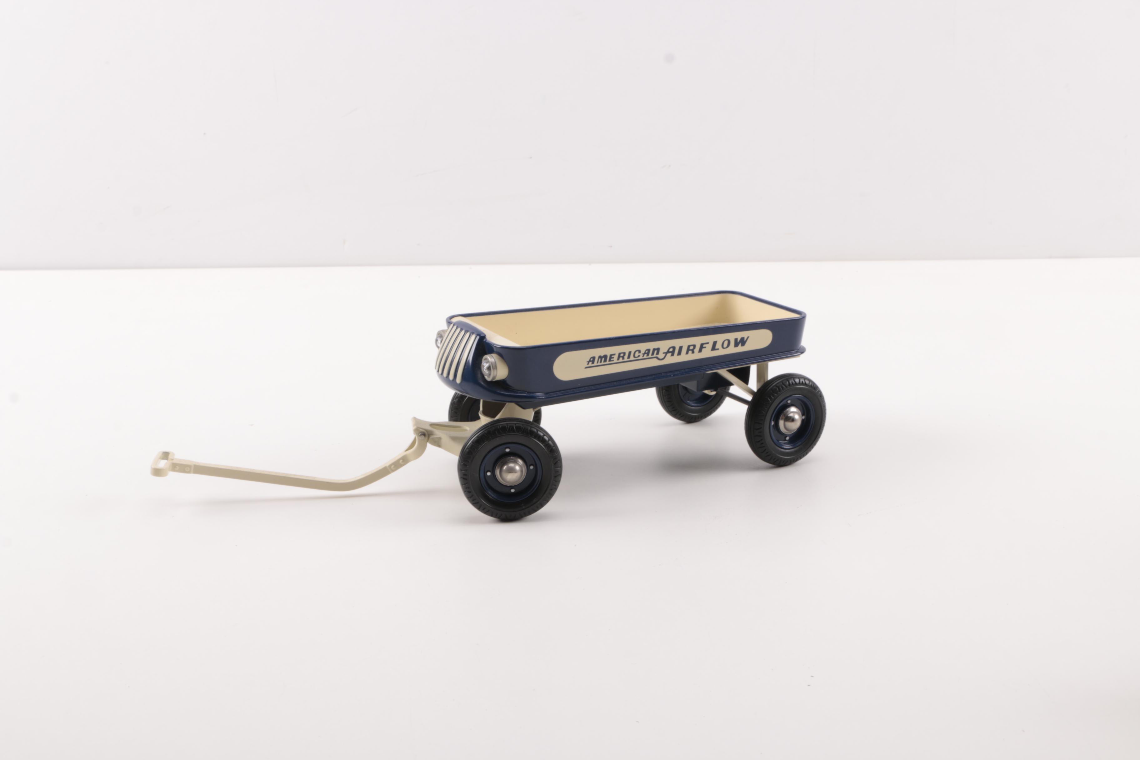 Three Toy Sized Wagons