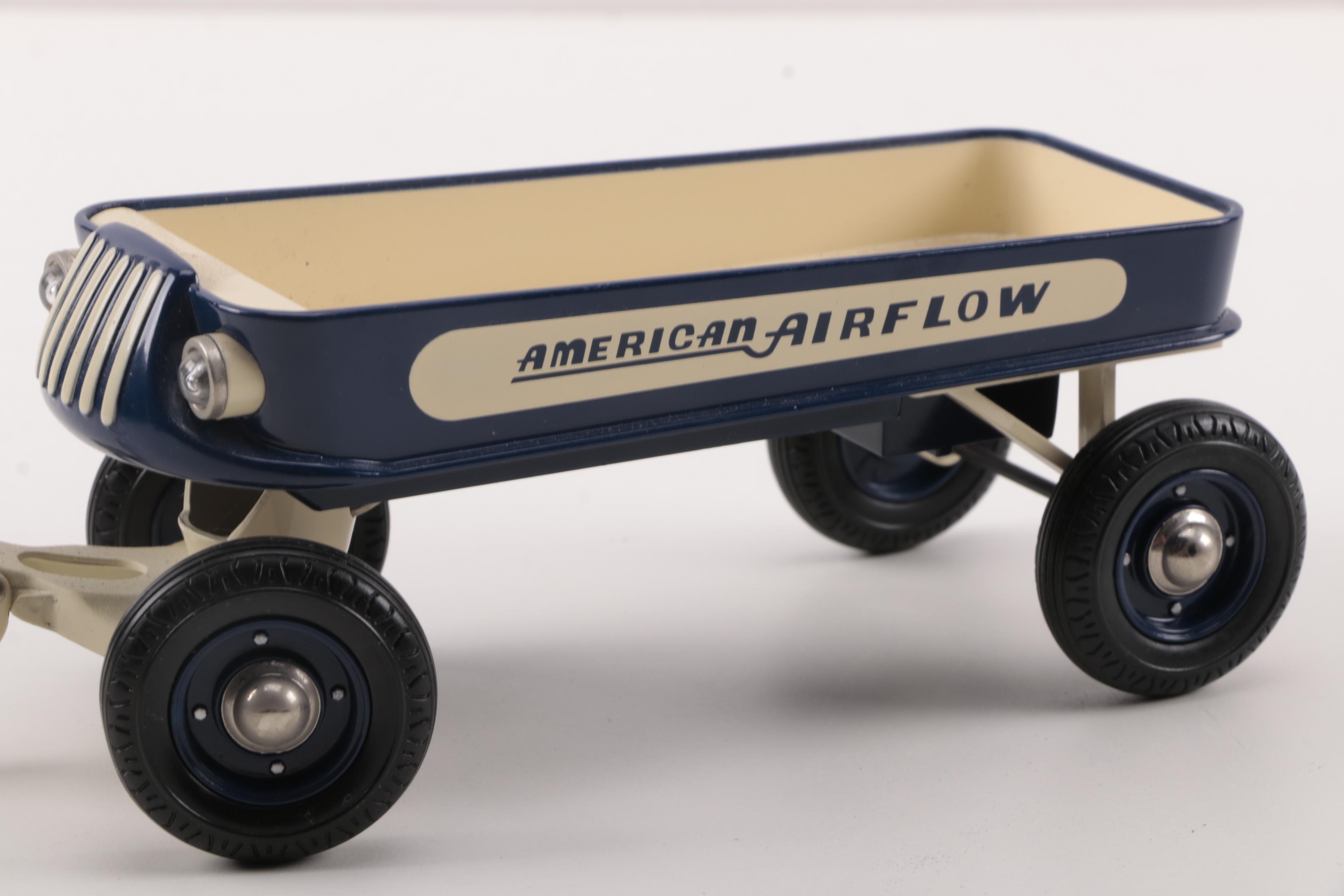 Three Toy Sized Wagons