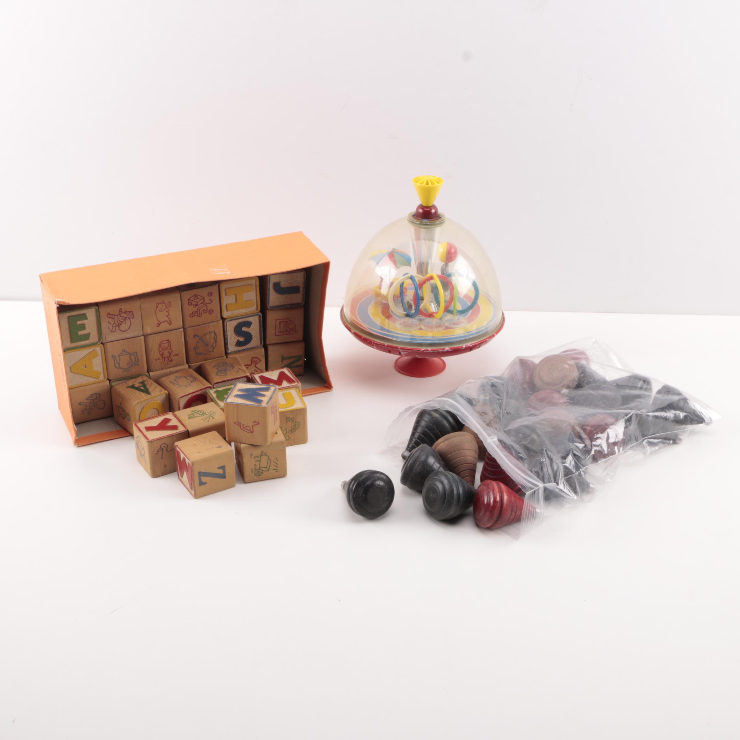 Spinning Tops and Alphabet Blocks