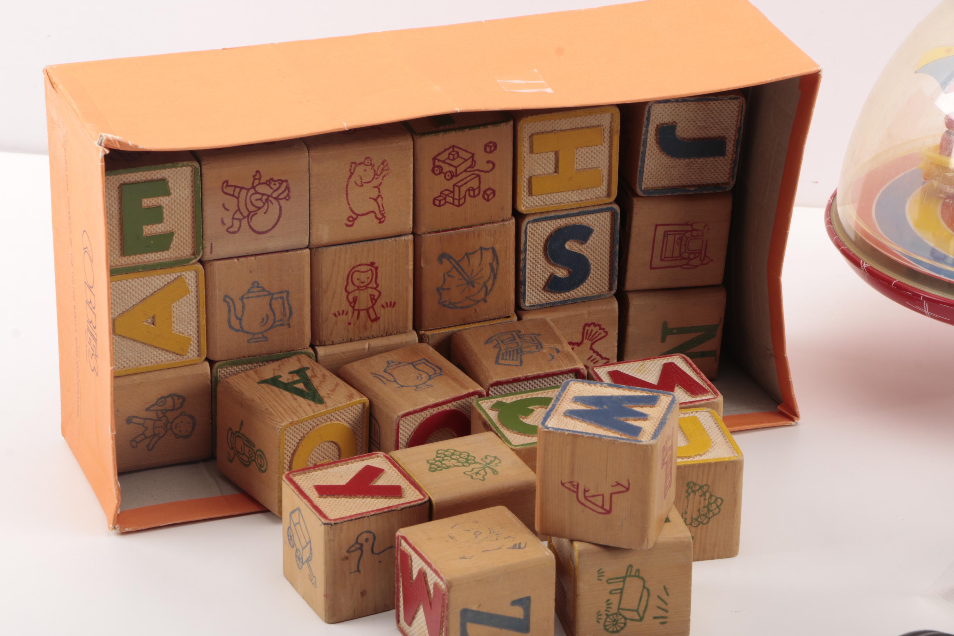 Spinning Tops and Alphabet Blocks