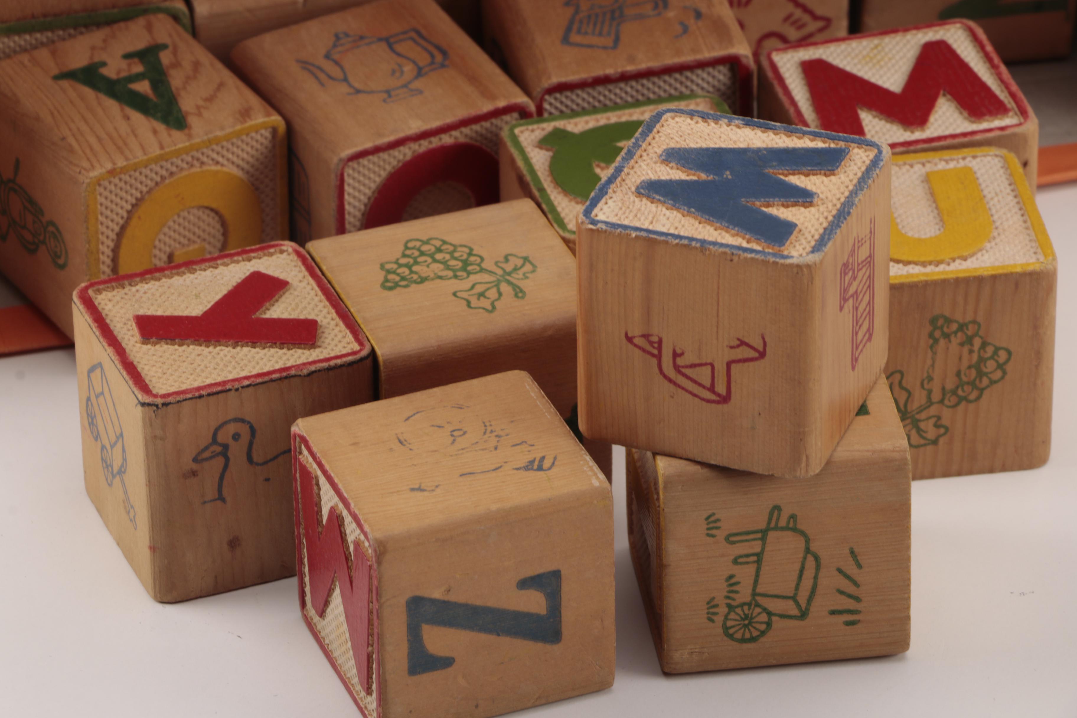 Spinning Tops and Alphabet Blocks
