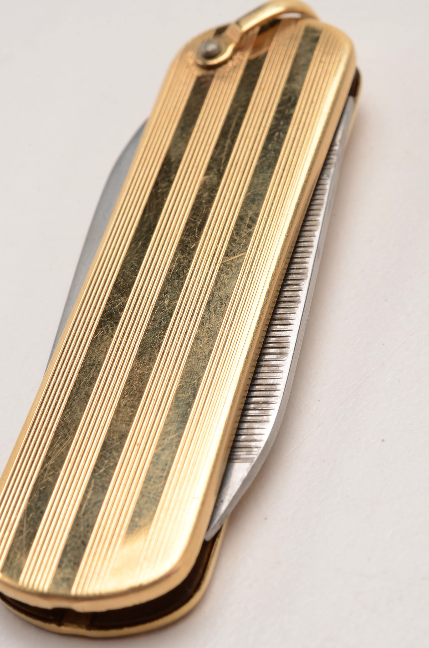 Sterling Silver Eagle Scott Ring and a Gold Tone Pocket Knife