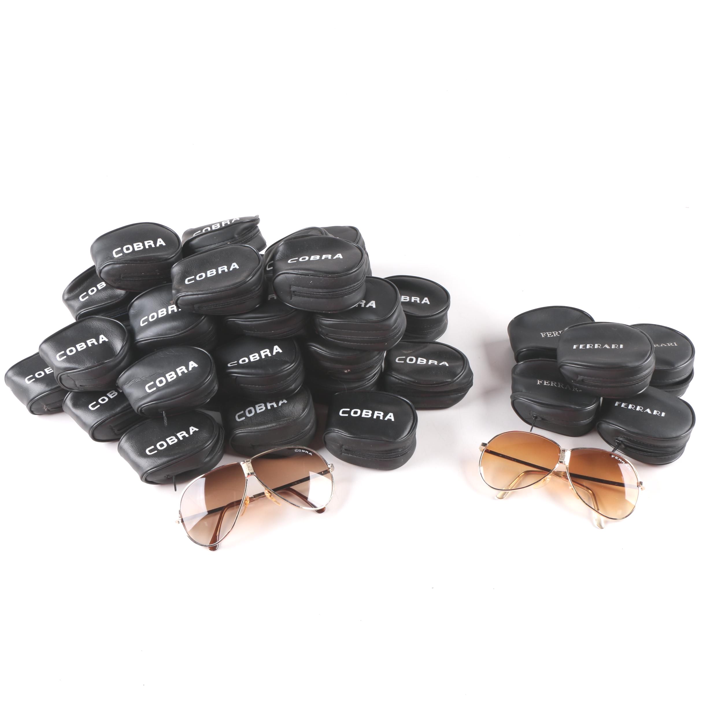 Collection of Foldable Sunglasses and Cases by Cobra and Ferrari
