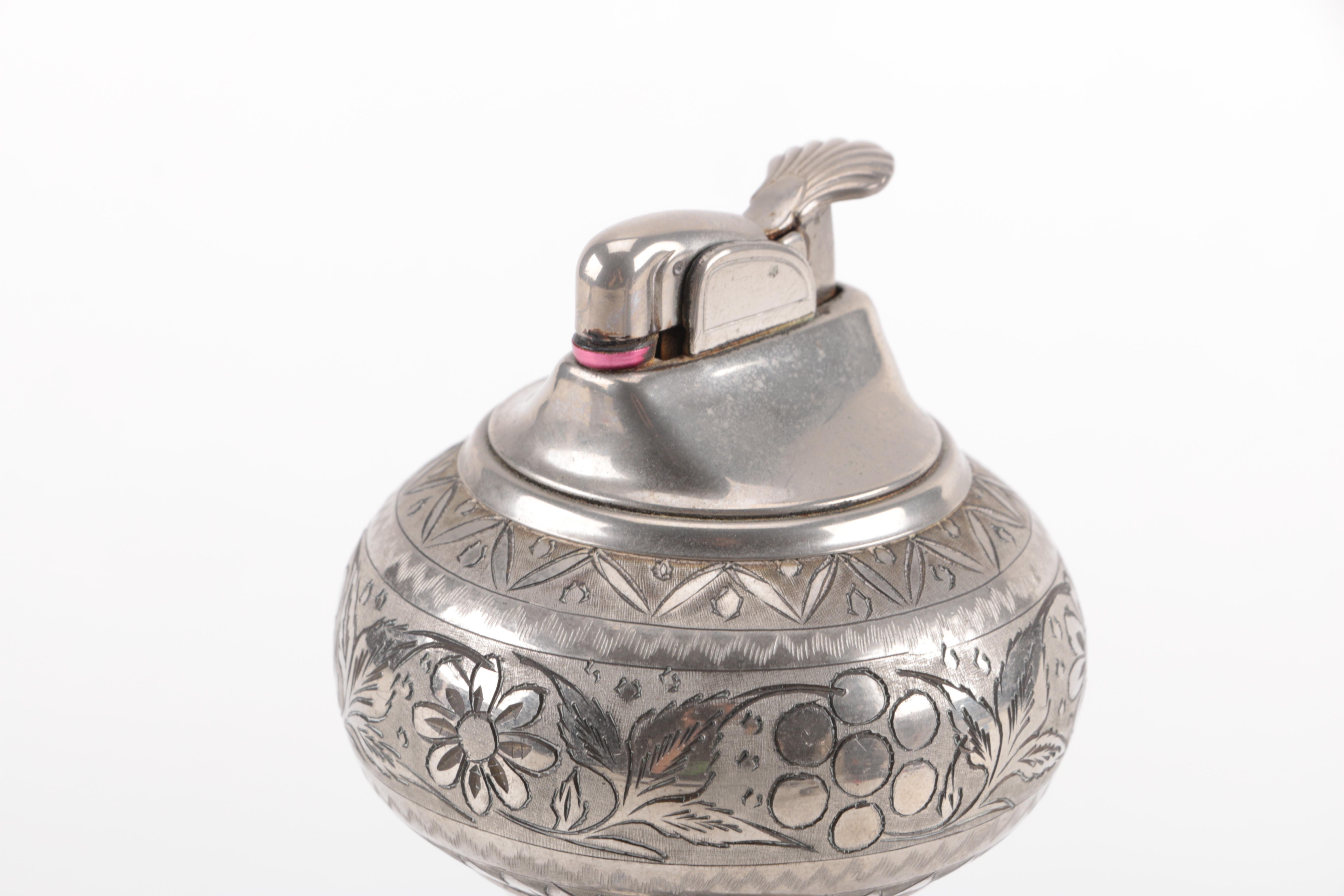 Etched Metal Table Lighter and Cigarette Holder with Musical Aspects