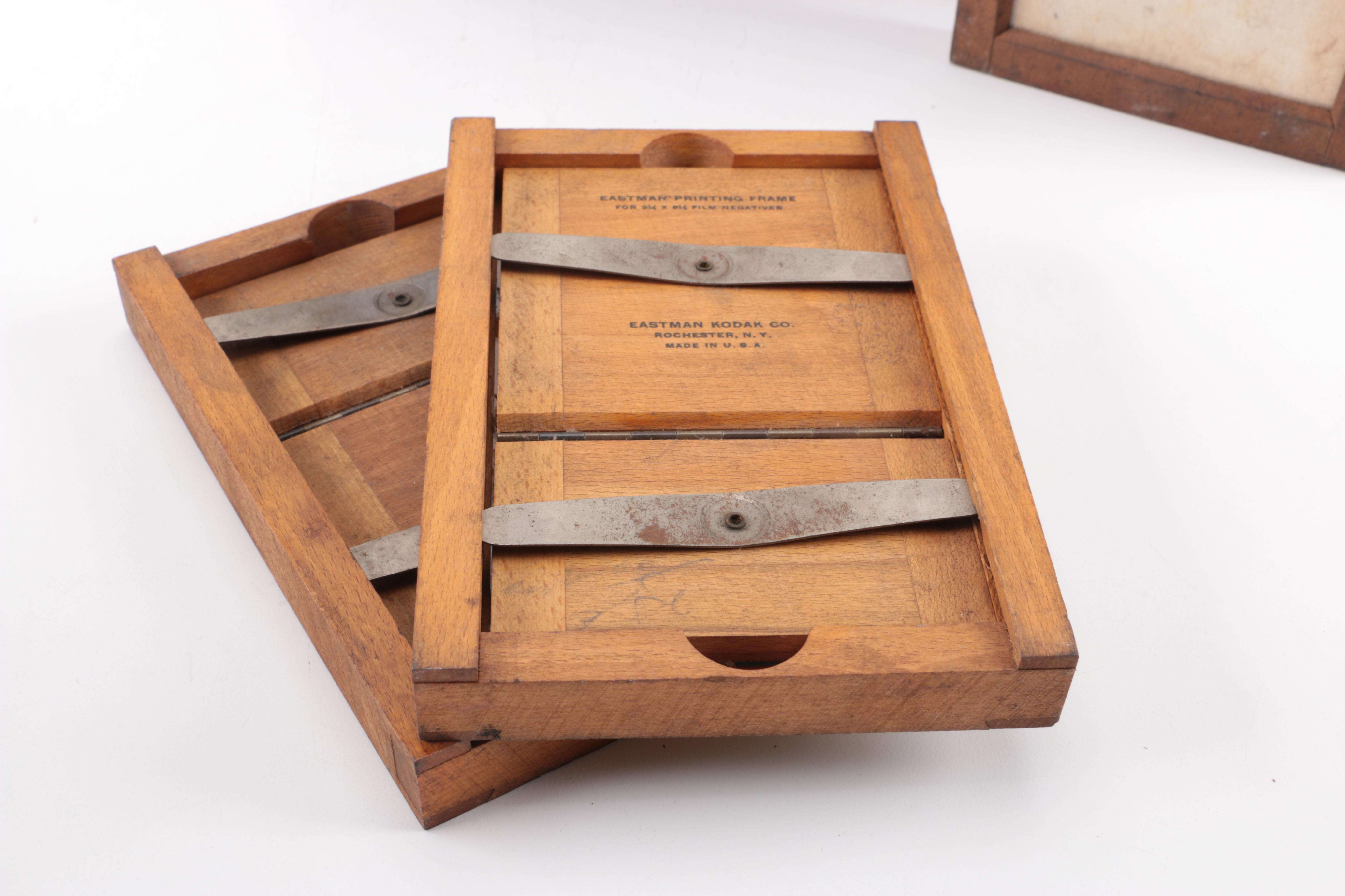Collection of Antique Photographs and Wooden Printing Frames
