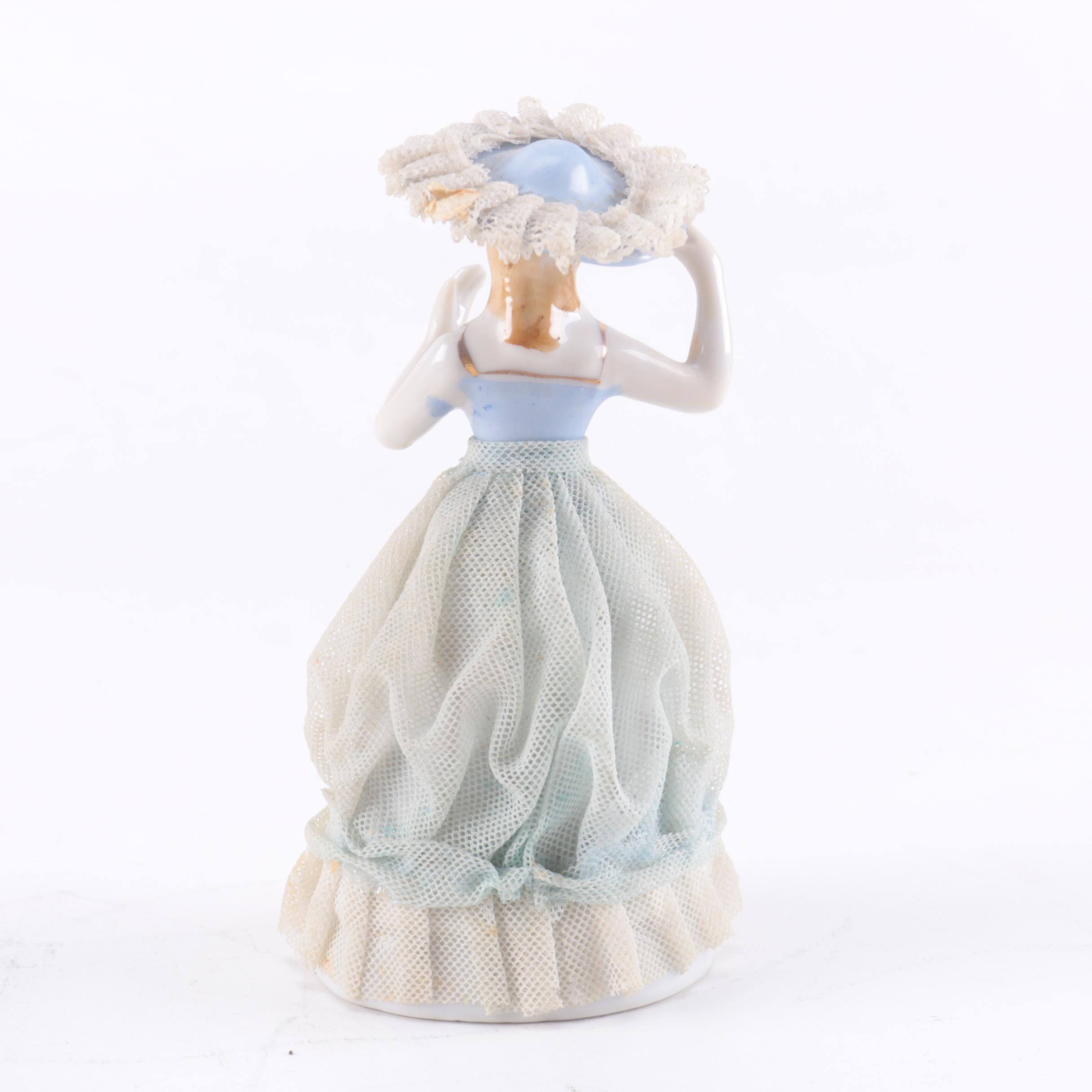 Three Women Ceramic Figurines