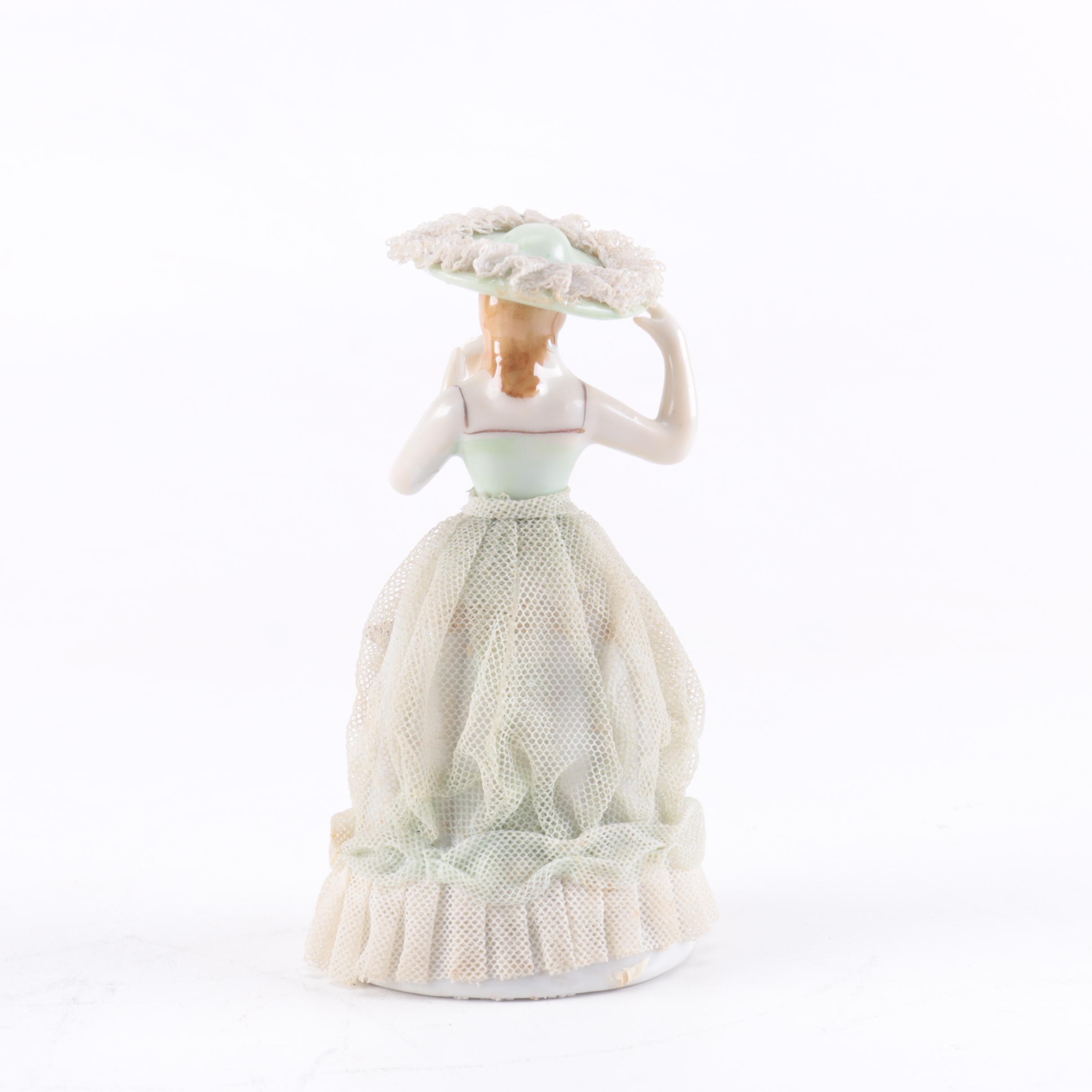 Three Women Ceramic Figurines