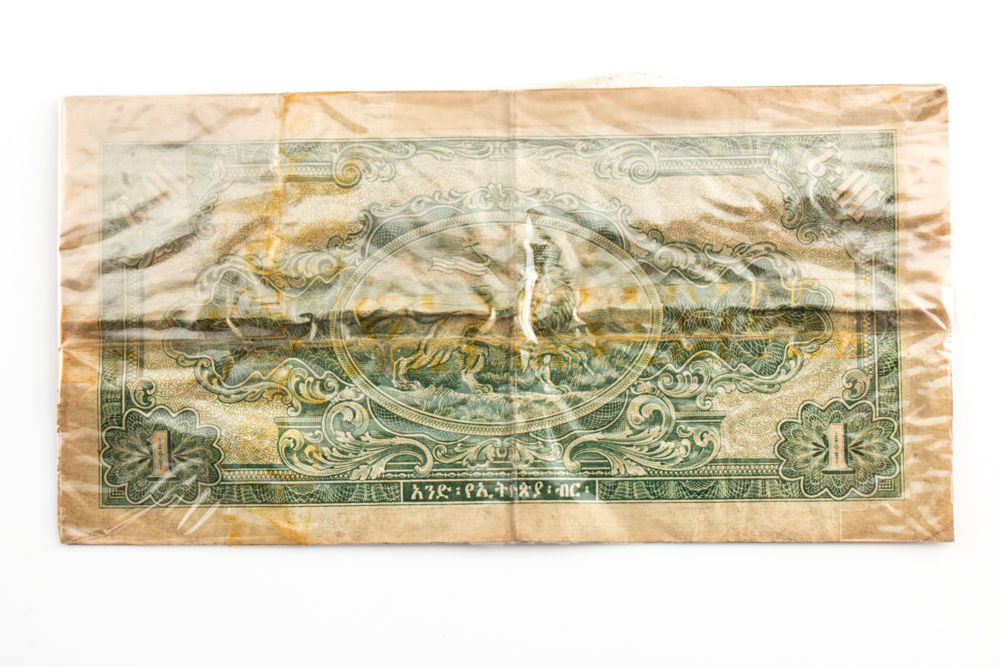 Group of Ethiopian Currency and a 1982 Falkland Islands Liberation Crown